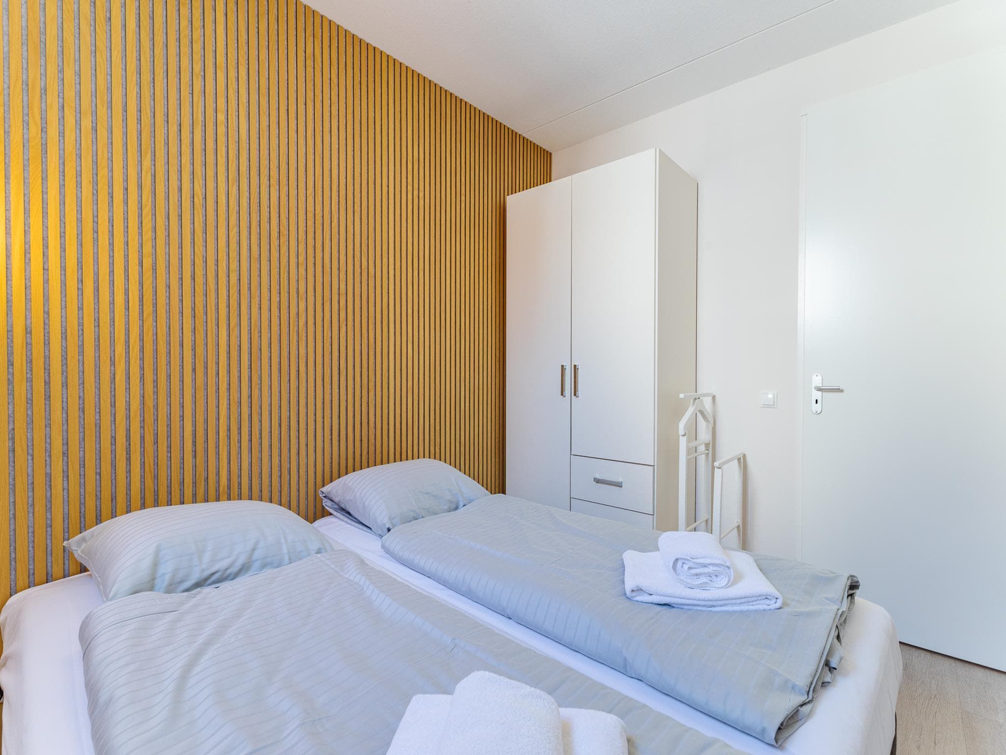 Een slaapkamer van Appartement Duinhof Dishoek 13M - 6 personen de luxe in Koudekerke