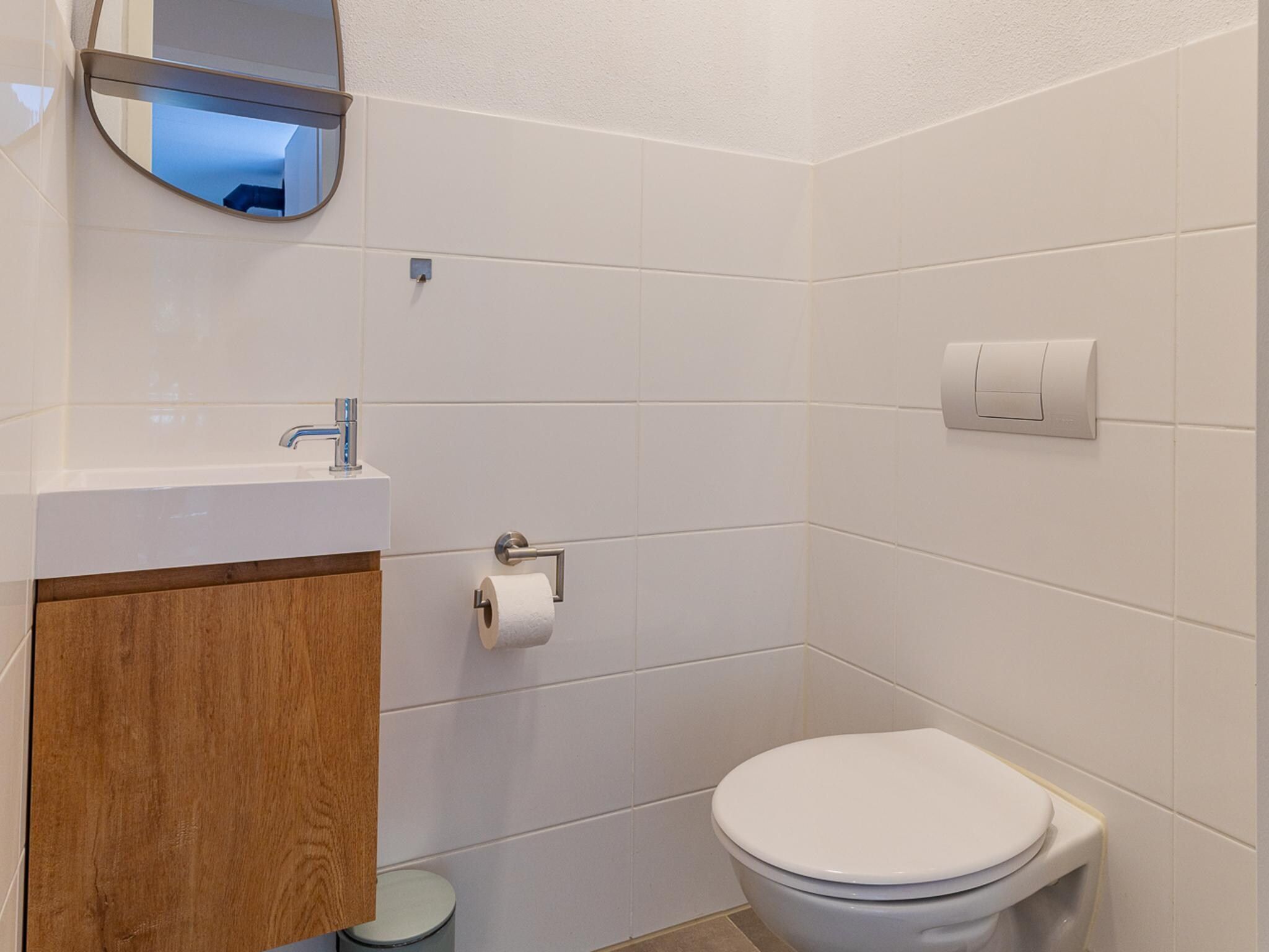 De badkamer van Appartement Duinhof Dishoek 13M - 6 personen de luxe in Koudekerke