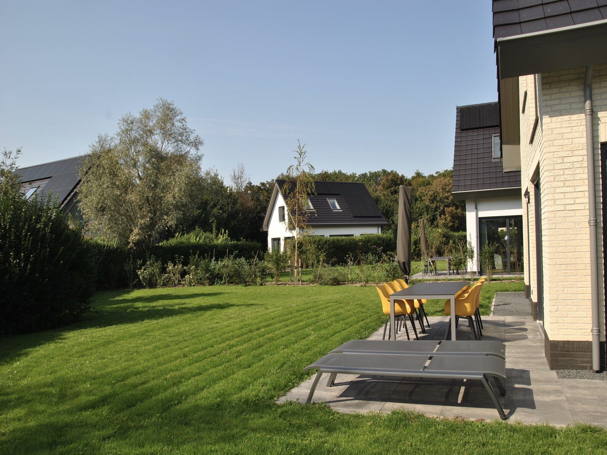 De tuin van De Koog nr 1 - 6 pers woning de luxe in De Koog Texel