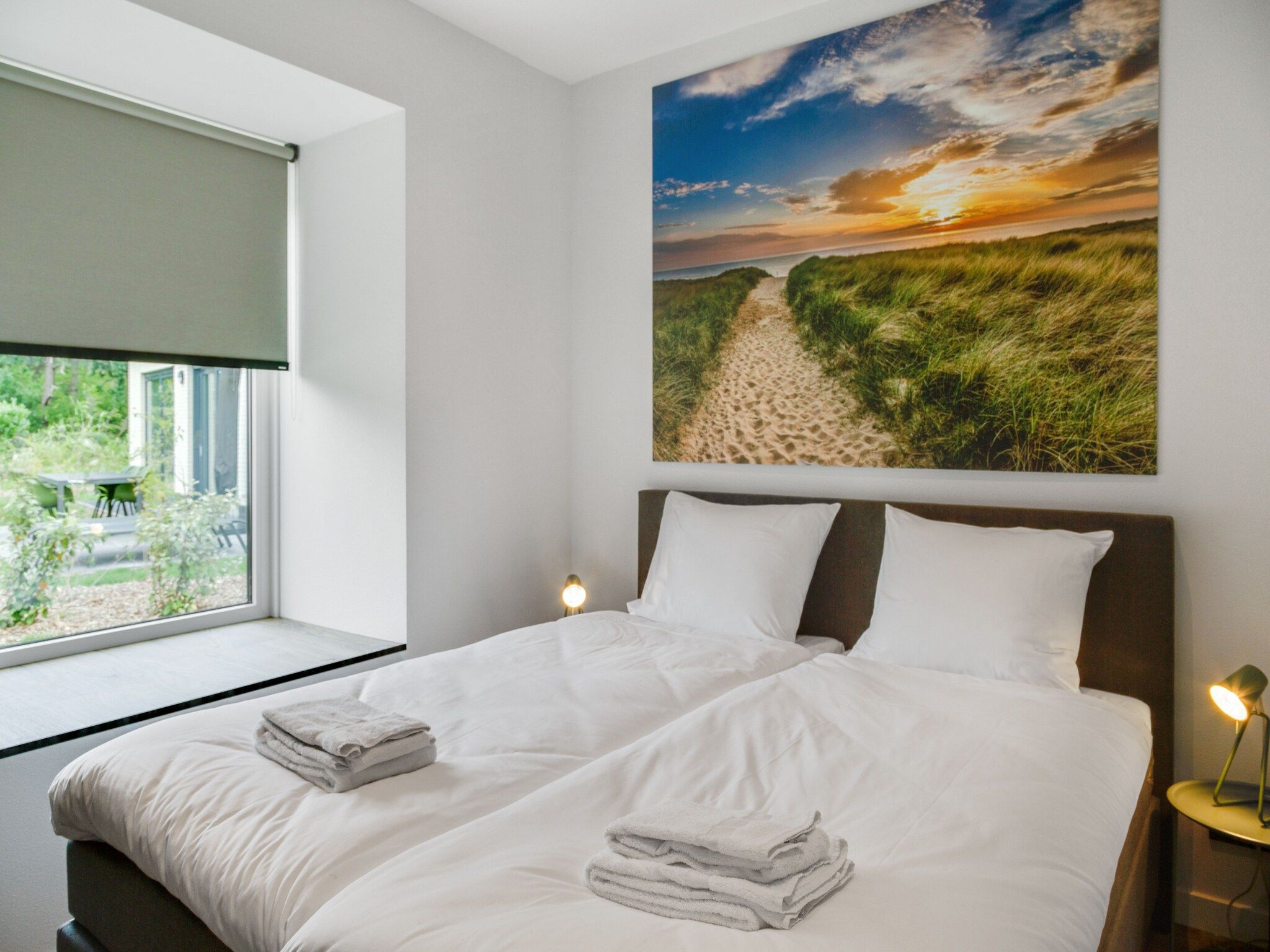 Een slaapkamer van De  Koog  nr 3 - 6 pers woning de luxe in De Koog Texel