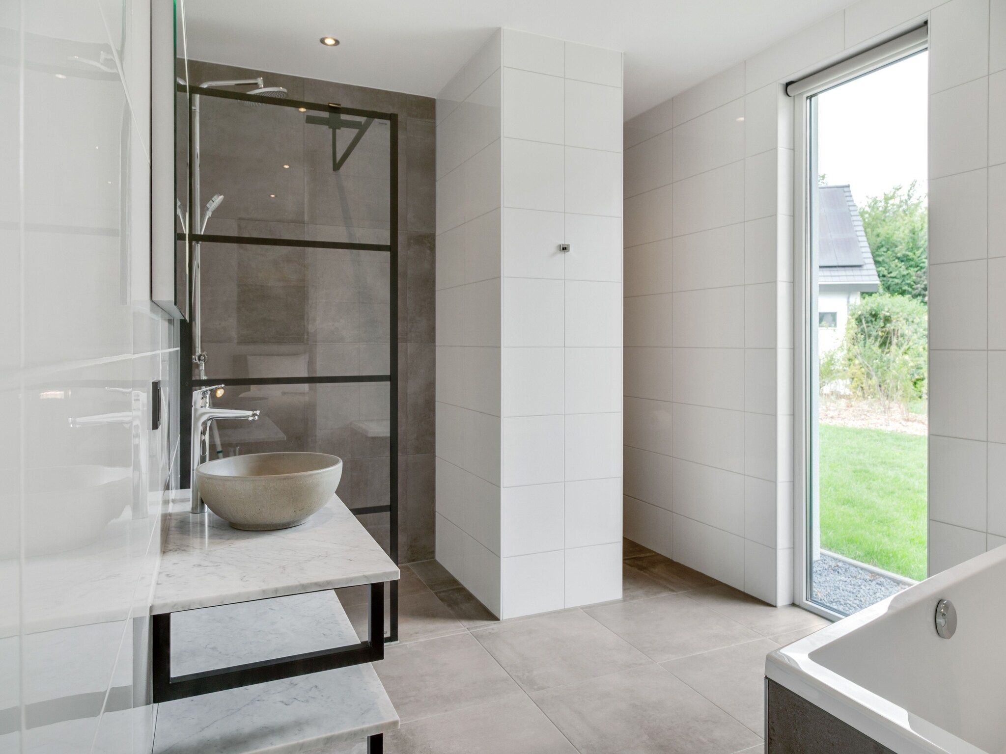 De badkamer van De Koog  nr 4 - 6 pers woning de luxe in De Koog Texel