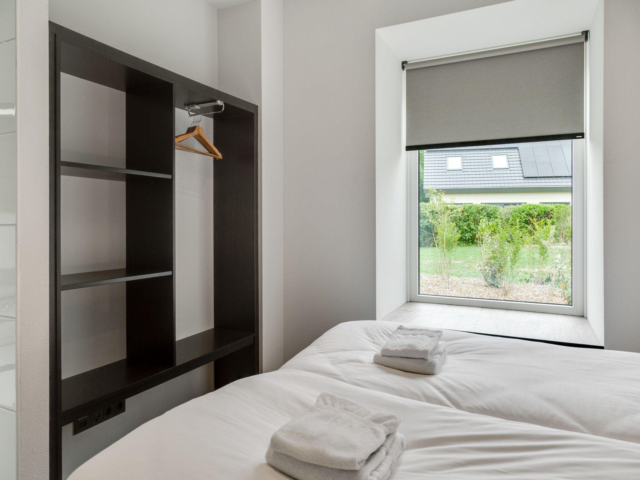 Een slaapkamer van De Koog  nr 5 - 6 pers woning de luxe in De Koog Texel