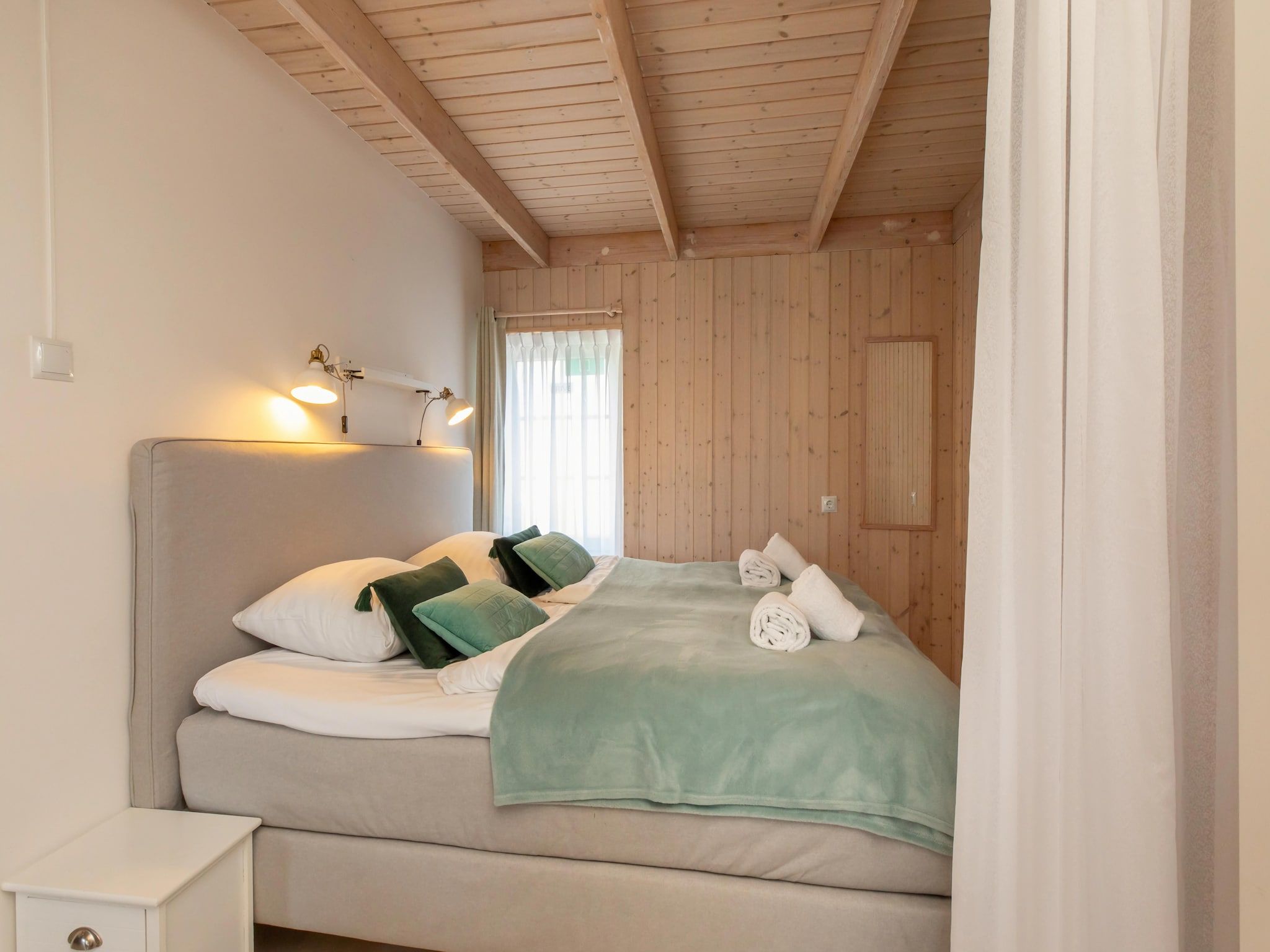 Een slaapkamer van Molenweg 27a in Zoutelande