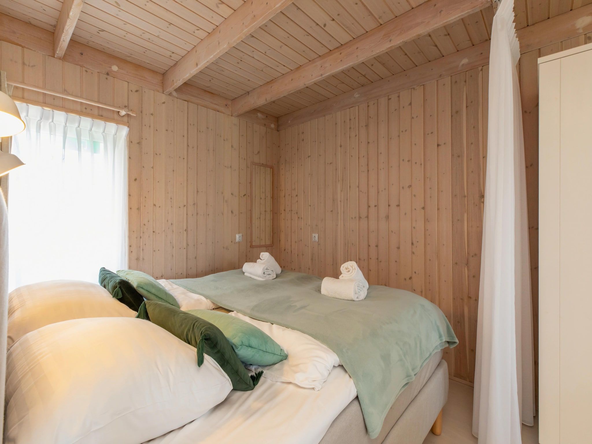 Een slaapkamer van Molenweg 27a in Zoutelande