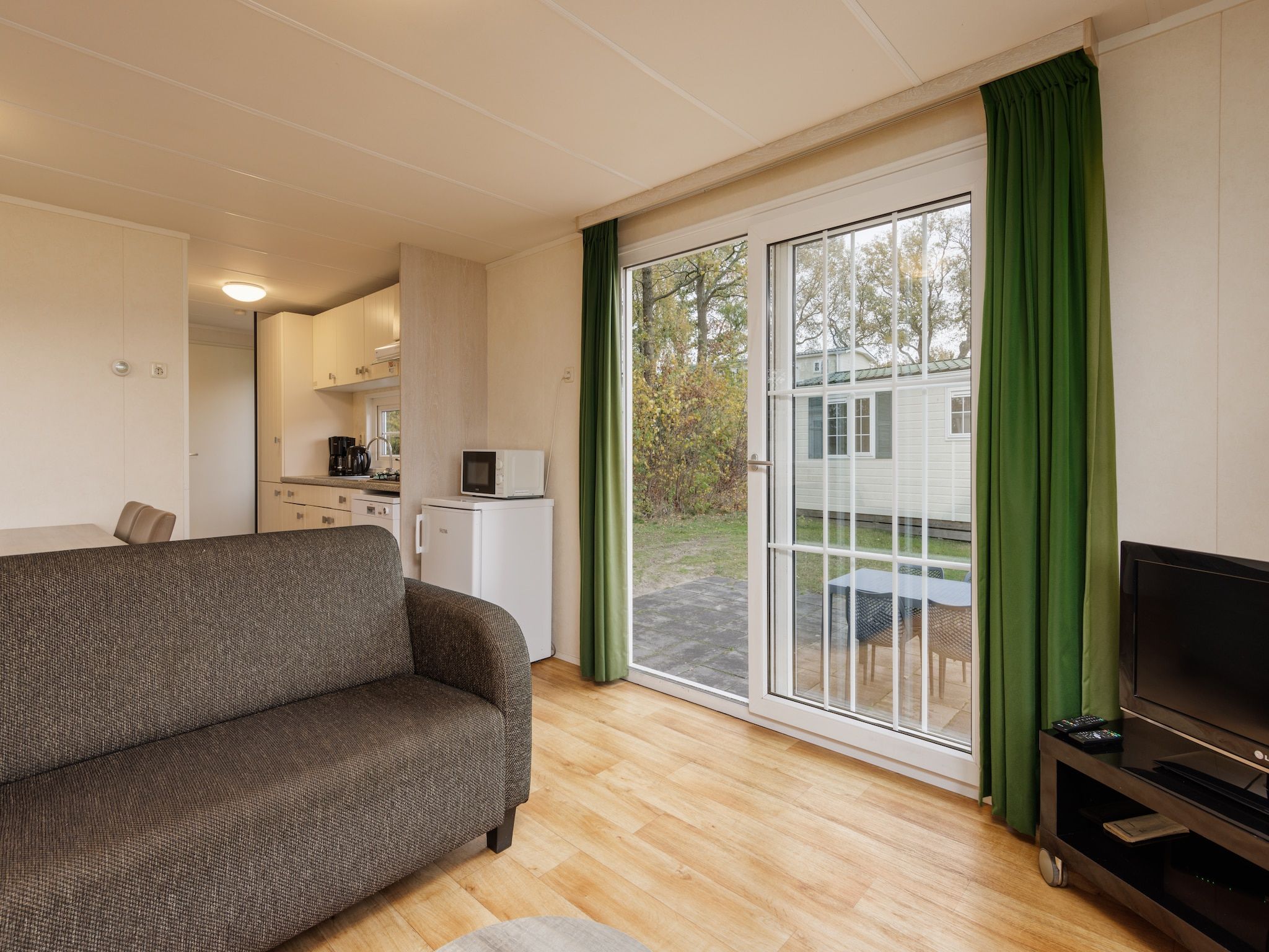 De woonkamer van Vakantiepark Hunzedal 13 in Borger
