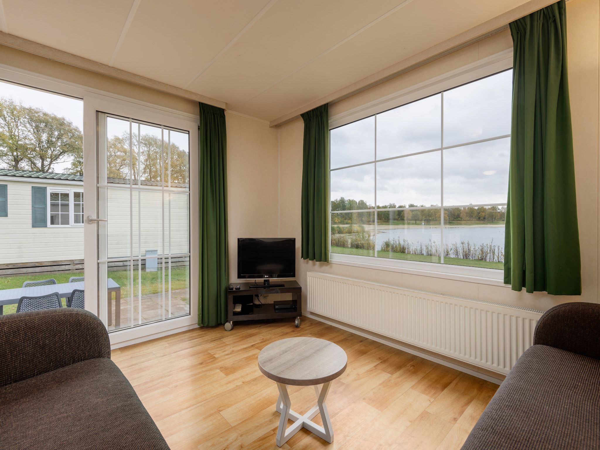 De woonkamer van Vakantiepark Hunzedal 13 in Borger