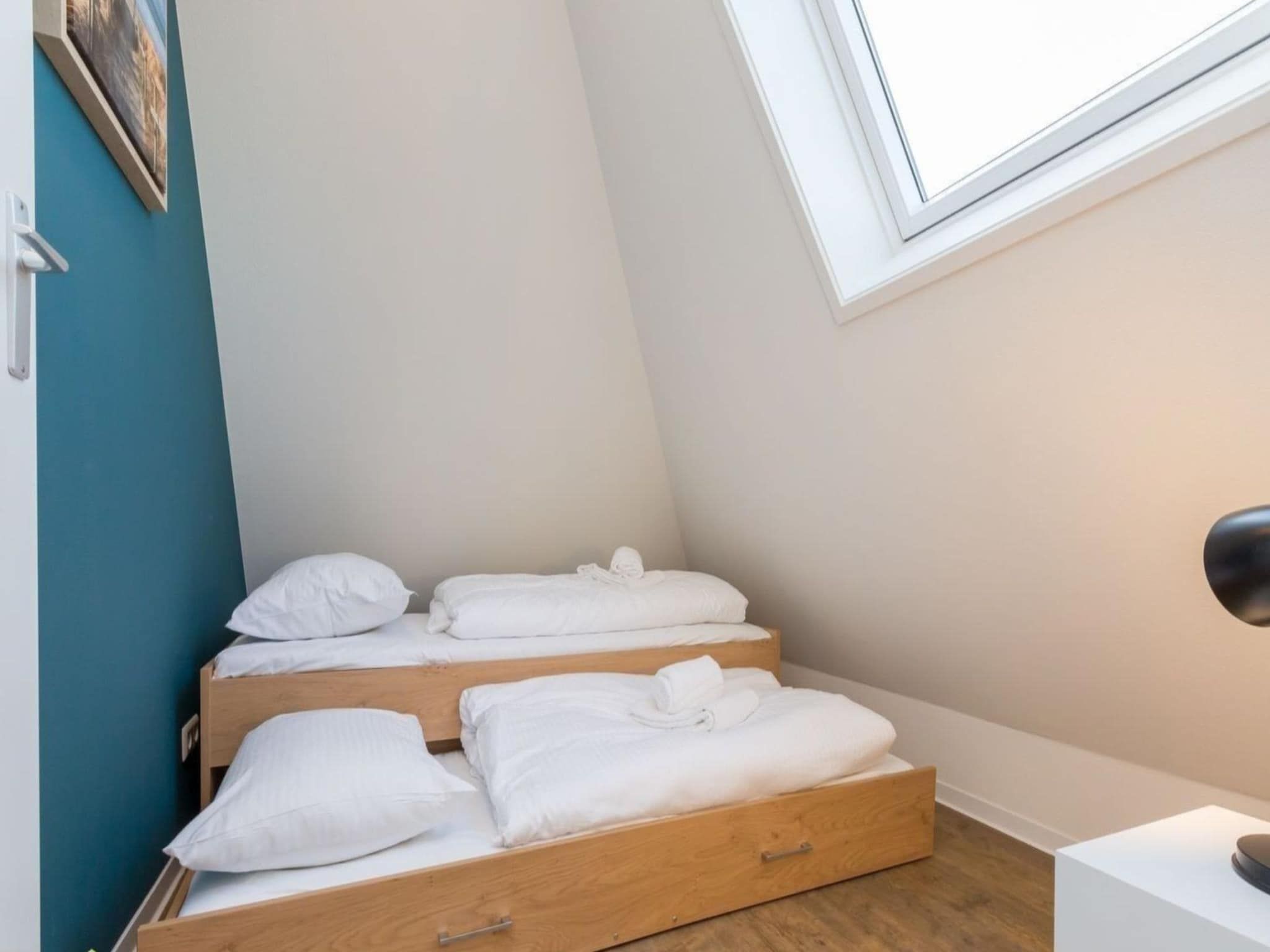 Een slaapkamer van Aparthotel Zoutelande - 6 pers luxe appartement huisdier in Zoutelande
