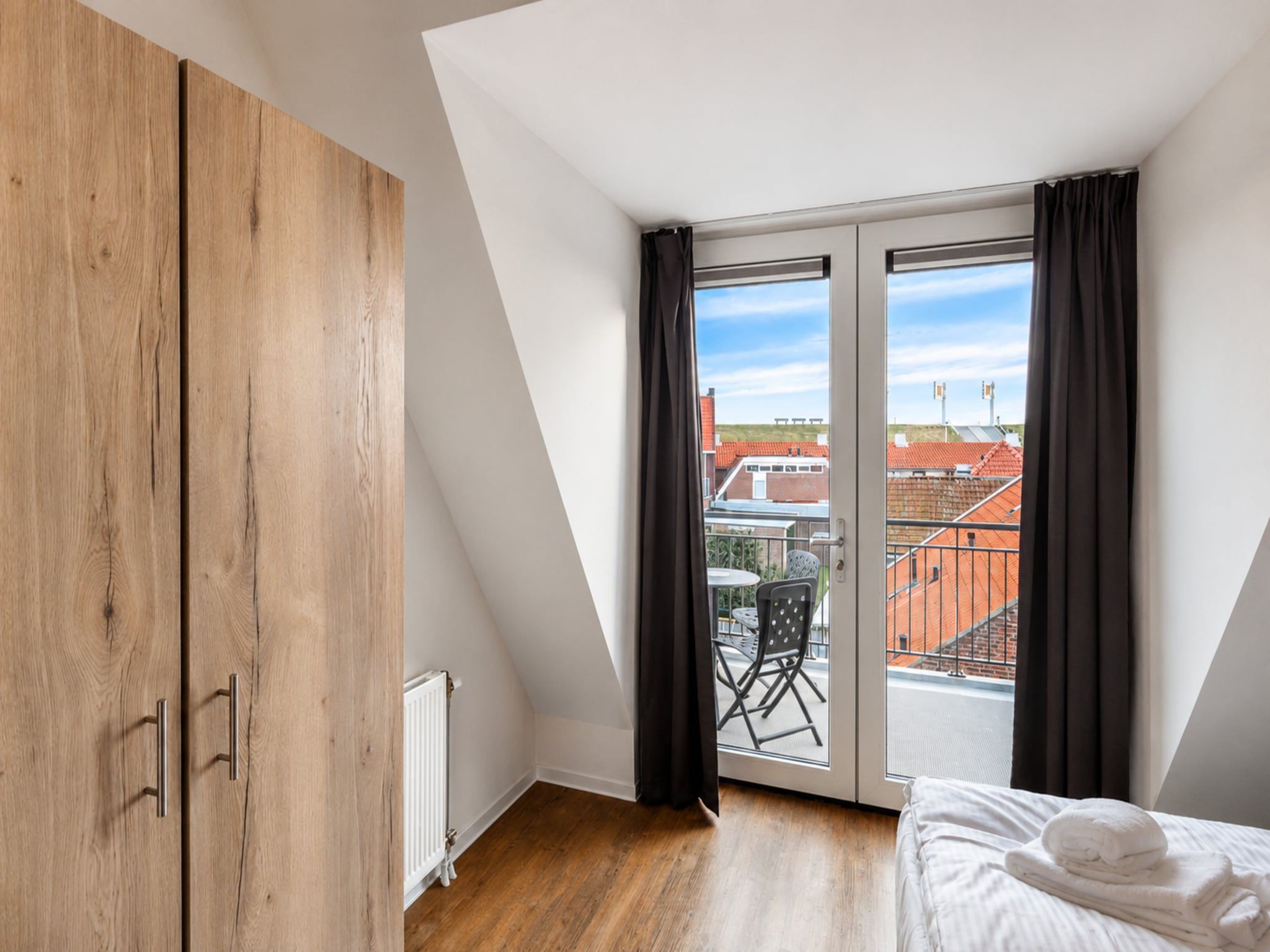 Een slaapkamer van Aparthotel Zoutelande - 6 pers luxe appartement huisdier in Zoutelande