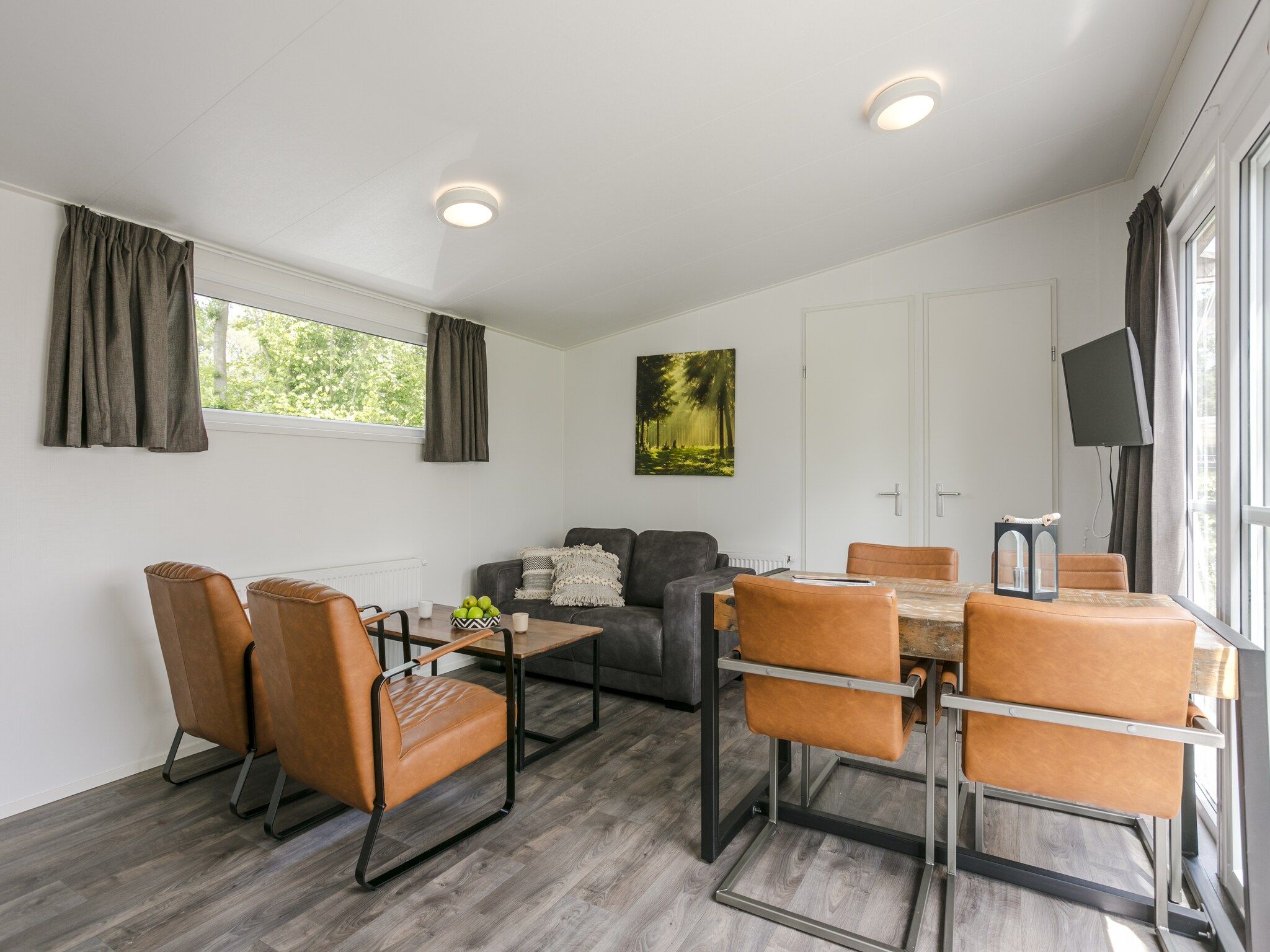 De woonkamer van Vakantiepark De Lochemse Berg 2 in Lochem