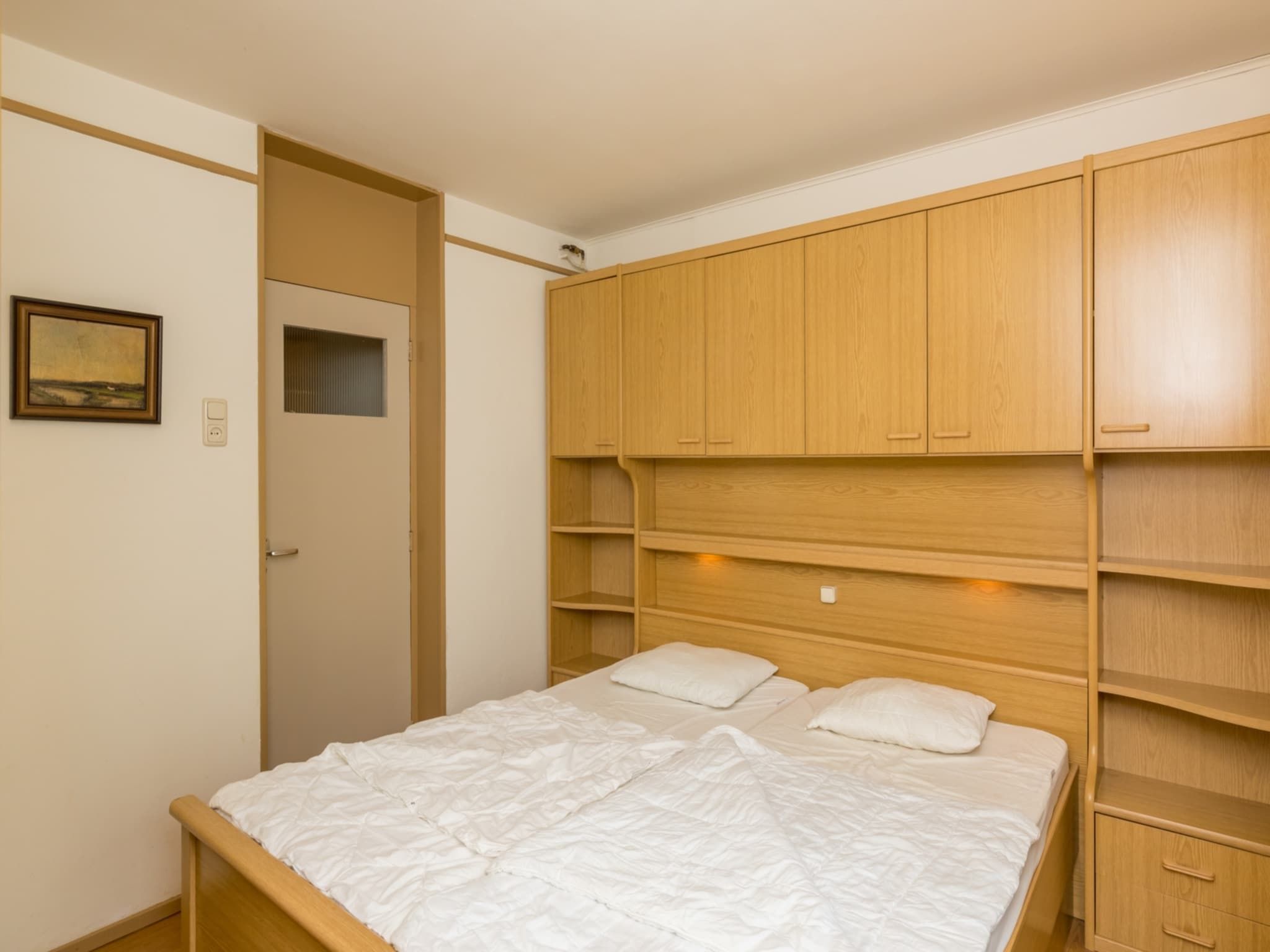 Een slaapkamer van Appartement - Burg van Woelderenlaan 100-2 in Walcheren