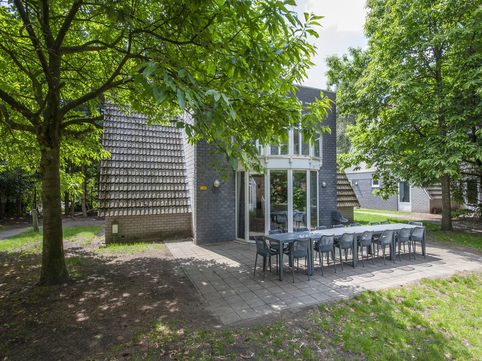 De woonkamer van Vakantiepark de Katjeskelder 13 in Oosterhout