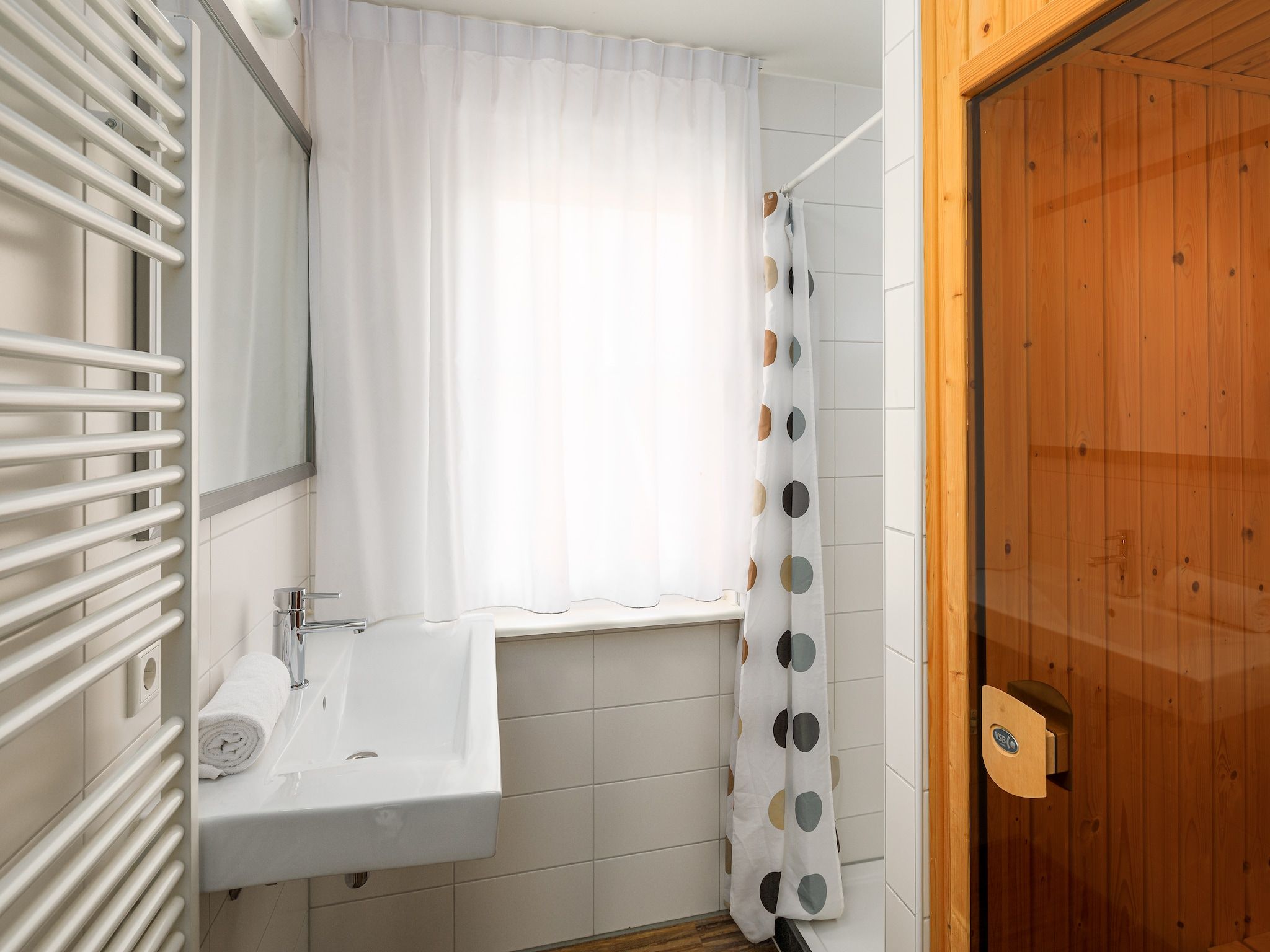 De badkamer van Résidence Klein Vink 7 in Arcen