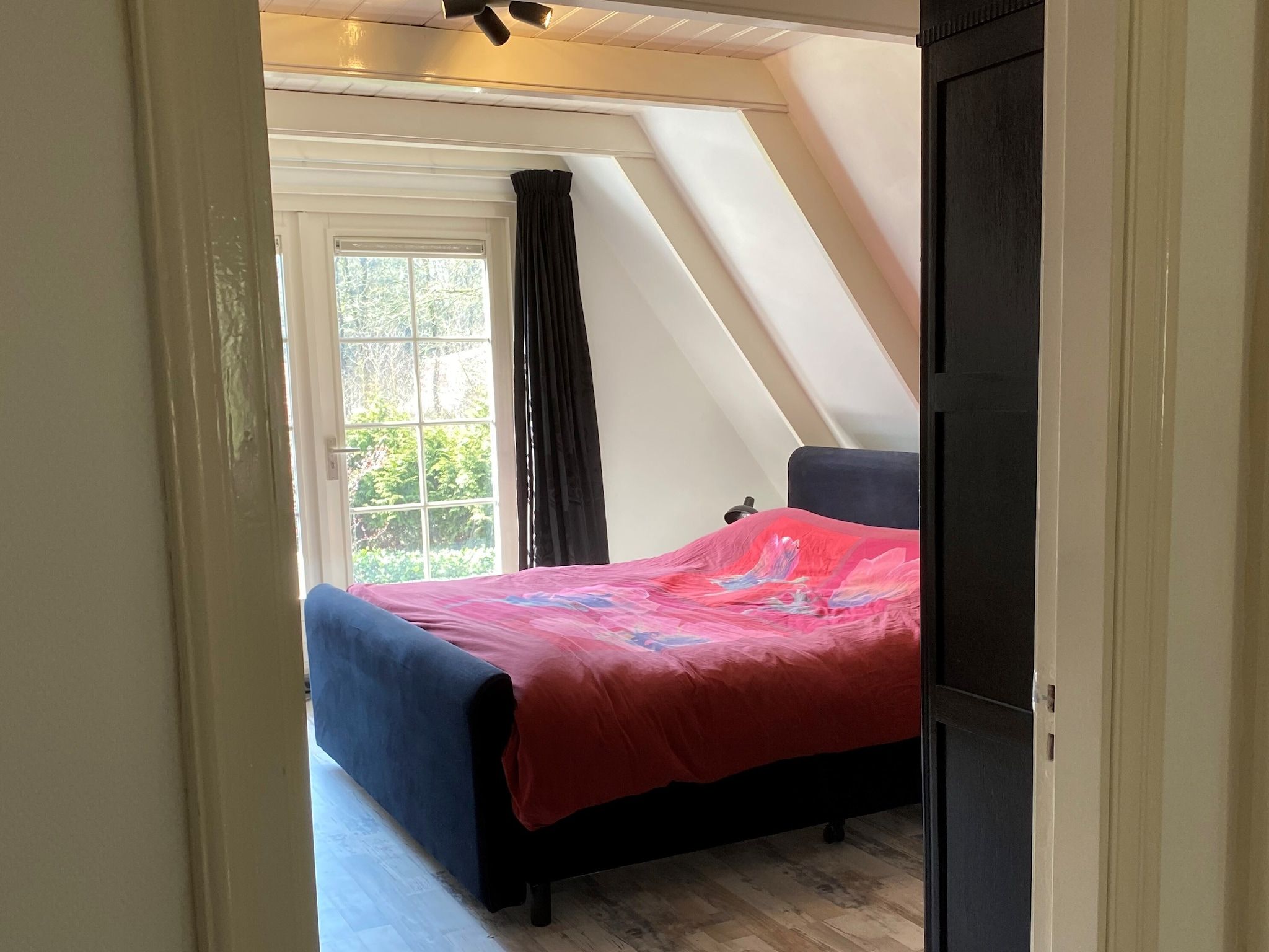 Een slaapkamer van Botterlodge in Wateren