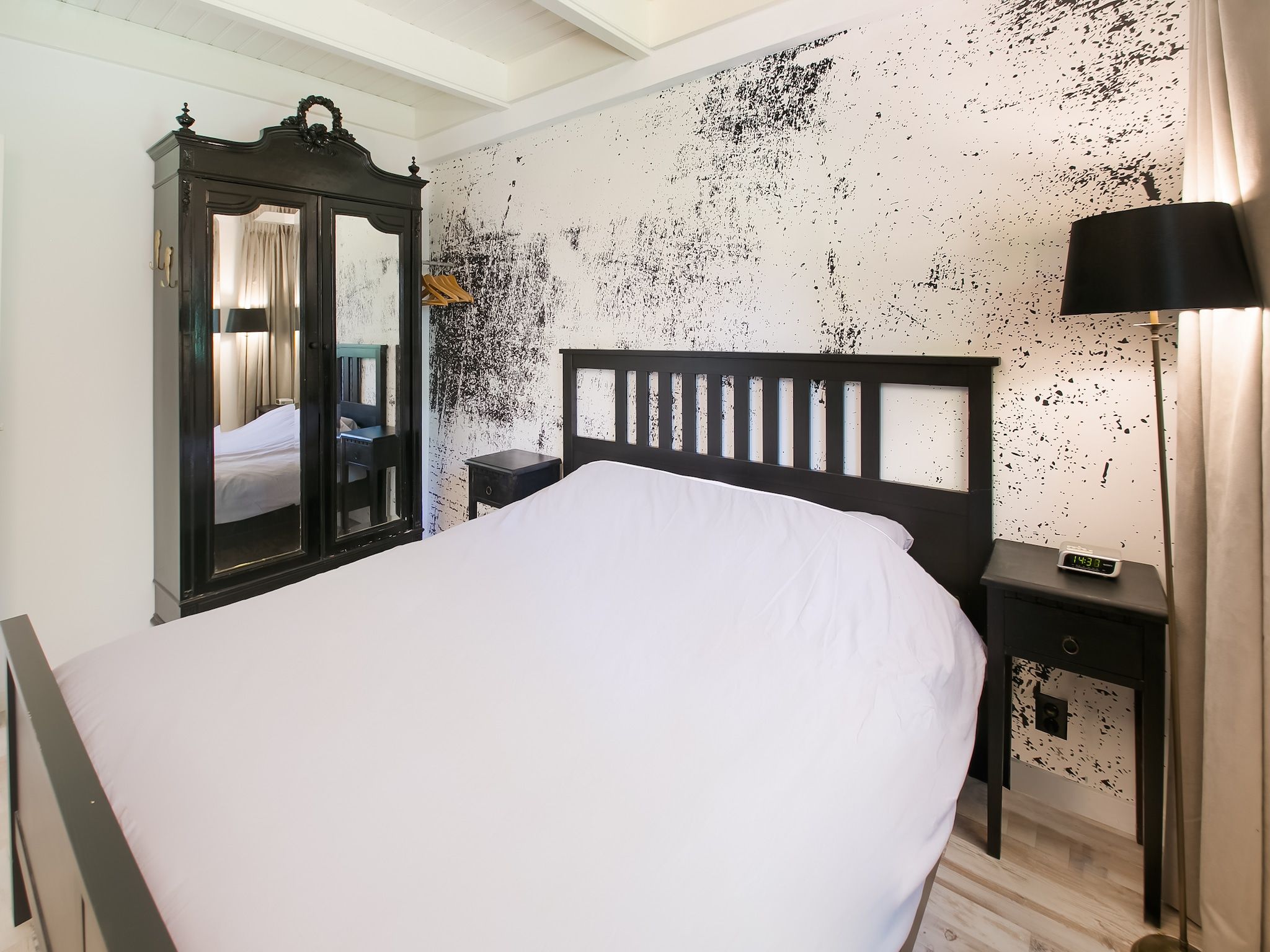 Een slaapkamer van Botterlodge in Wateren