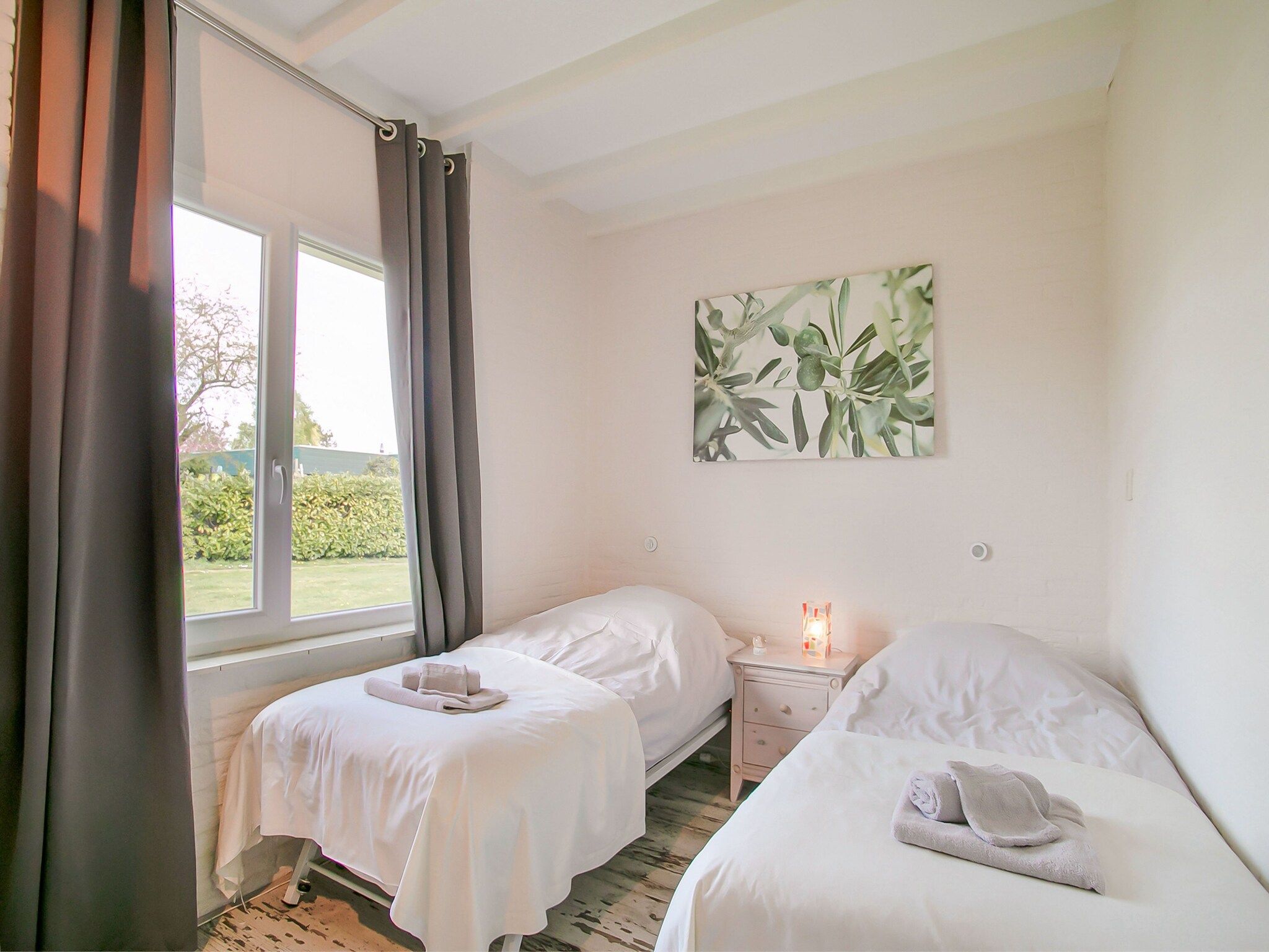 Een slaapkamer van Royal Palm in Noordwijkerhout