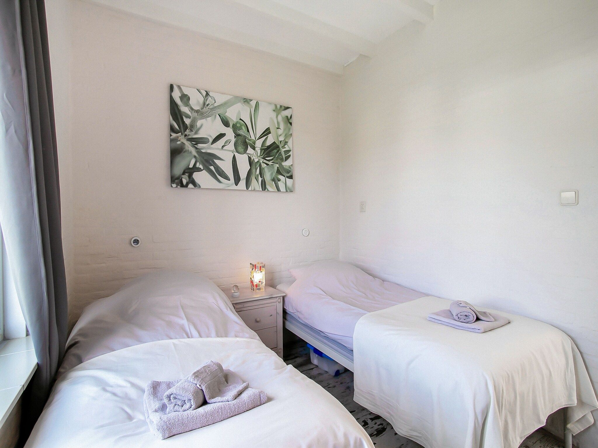 Een slaapkamer van Royal Palm in Noordwijkerhout
