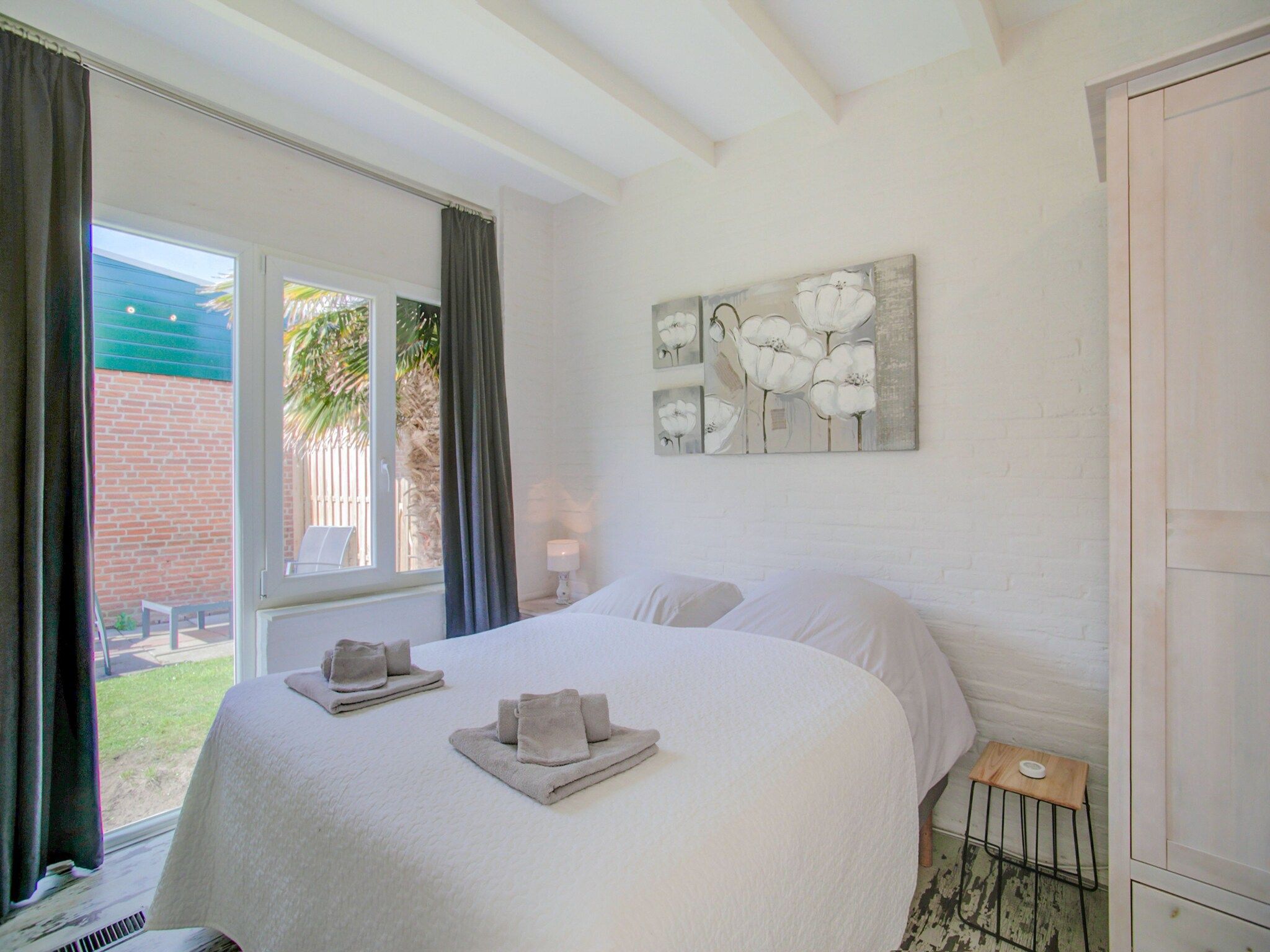 Een slaapkamer van Royal Palm in Noordwijkerhout