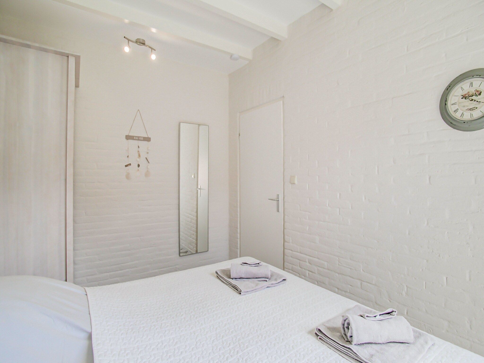 Een slaapkamer van Royal Palm in Noordwijkerhout