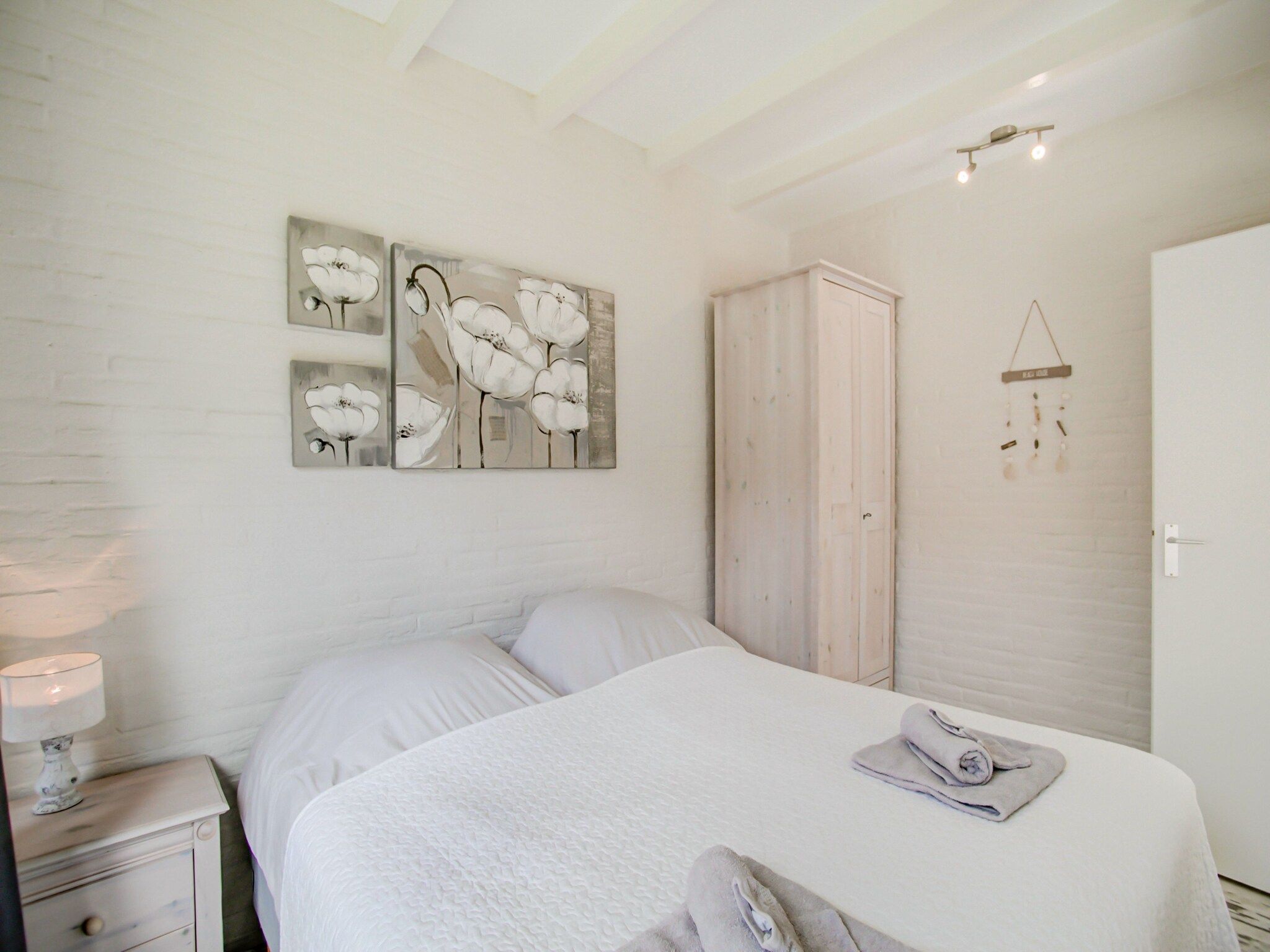 Een slaapkamer van Royal Palm in Noordwijkerhout