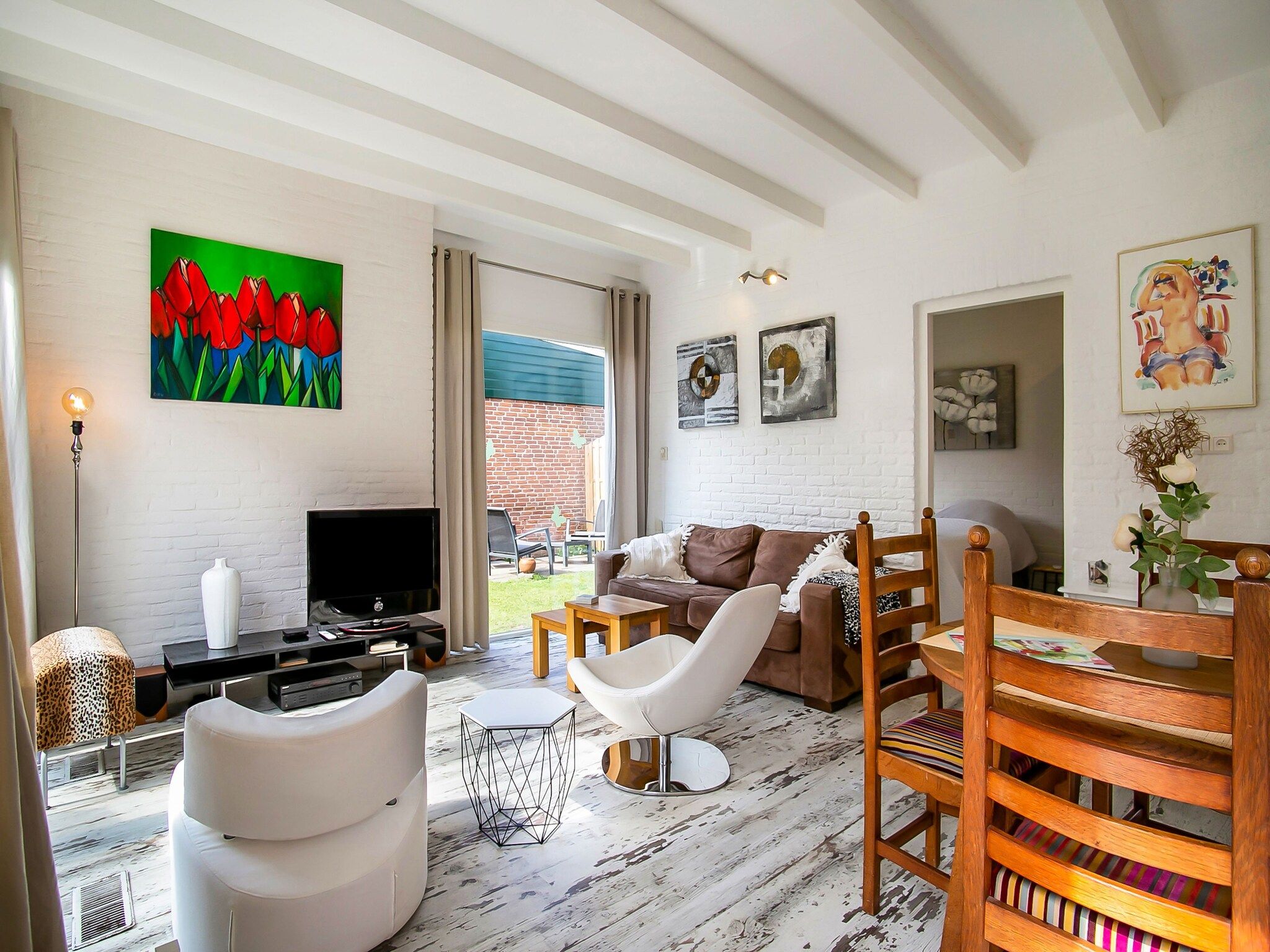 De woonkamer van Royal Palm in Noordwijkerhout