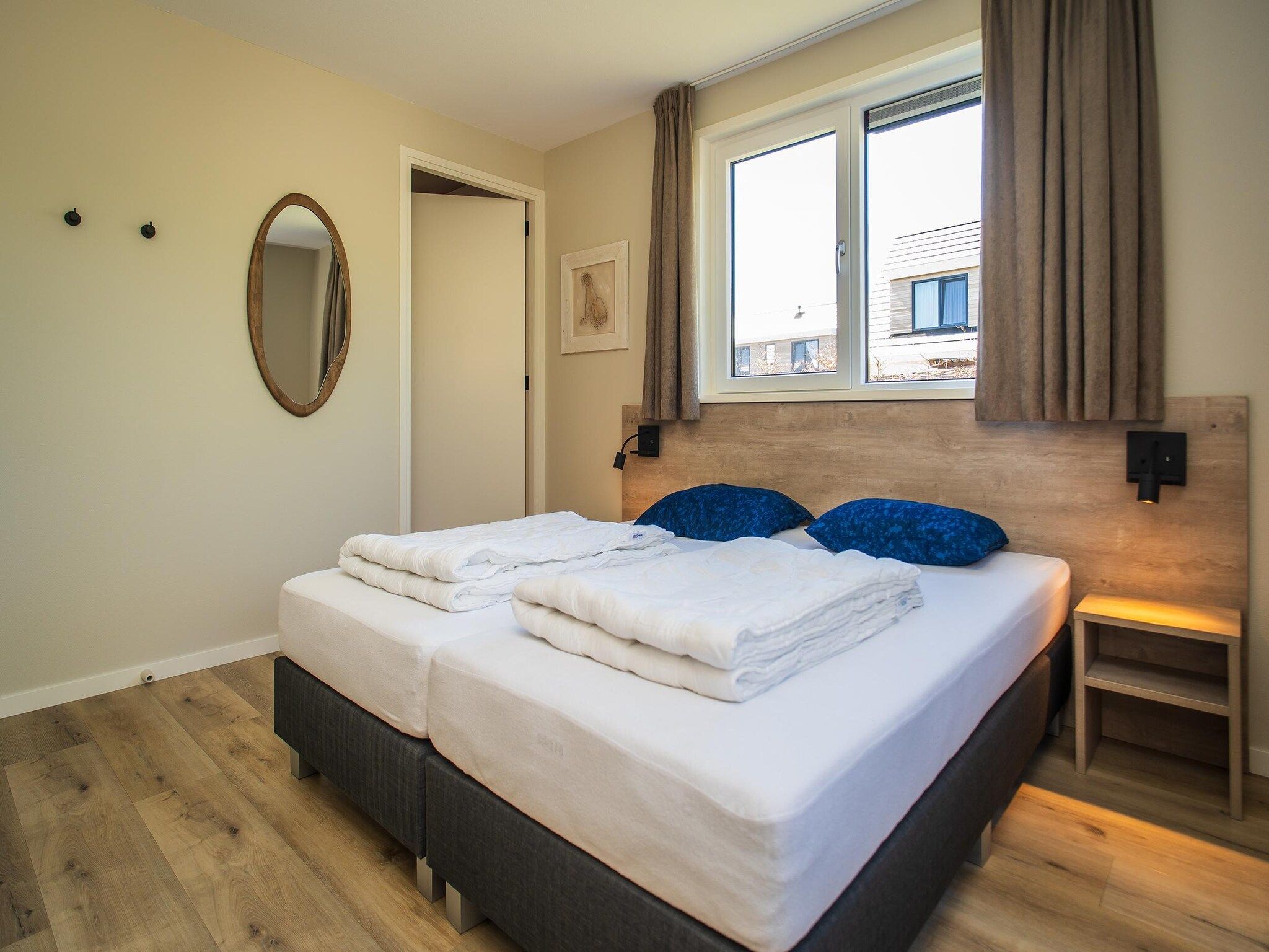 Een slaapkamer van So What 21 in De Koog Texel