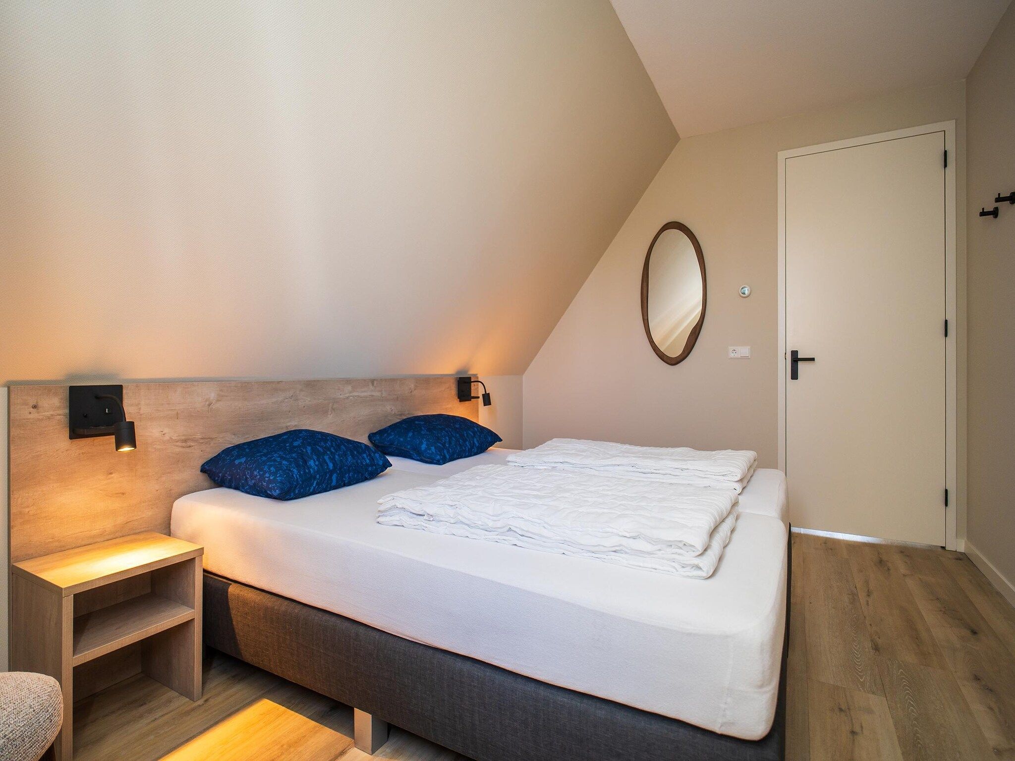 Een slaapkamer van So What 21 in De Koog Texel