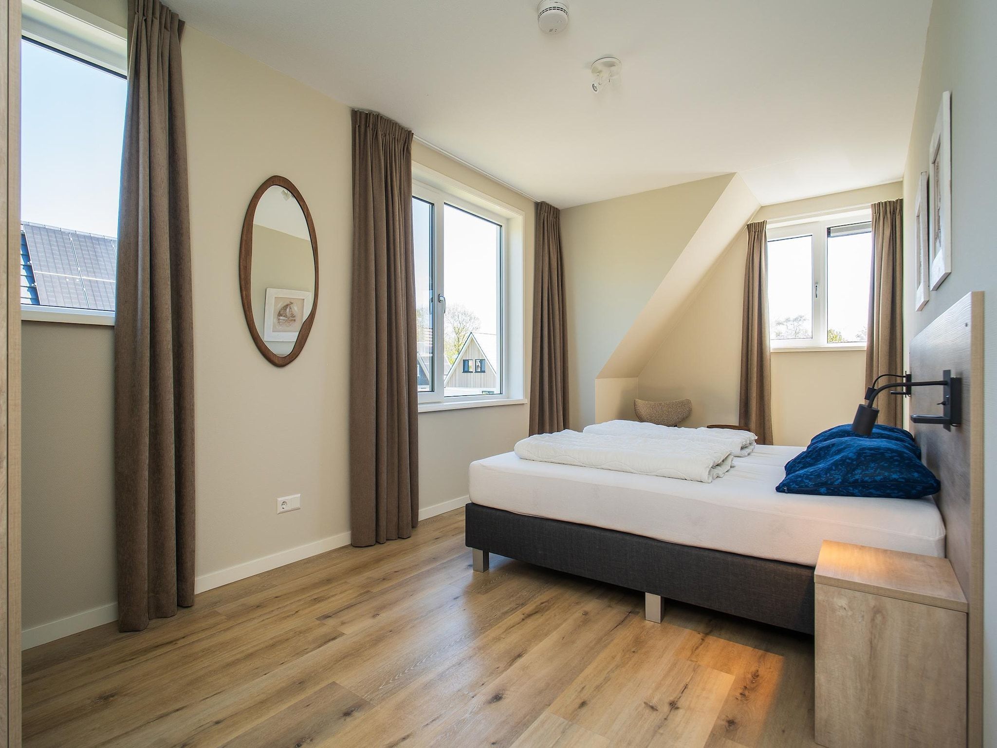 Een slaapkamer van So What 21 in De Koog Texel