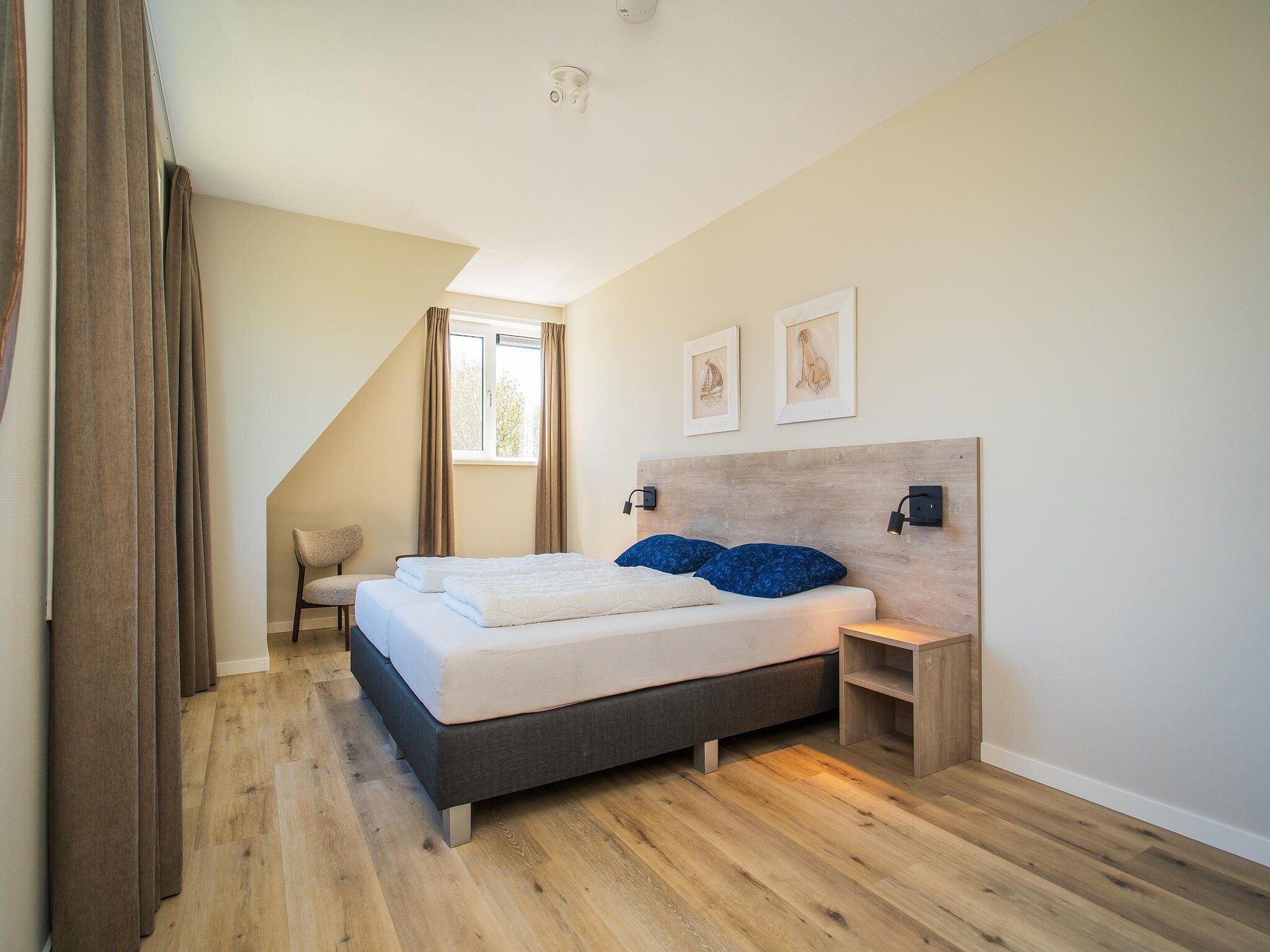 Een slaapkamer van So What 21 in De Koog Texel