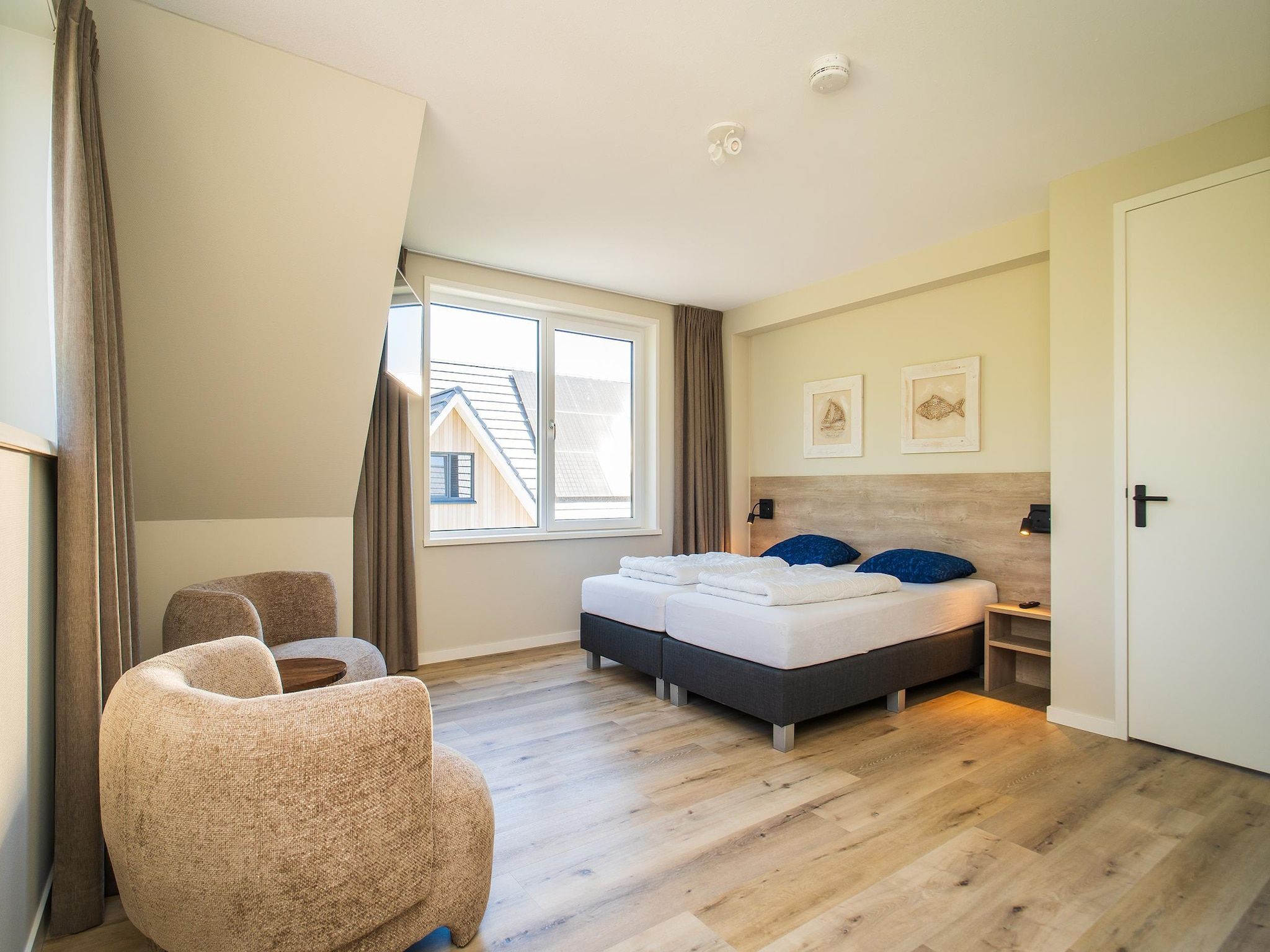 Een slaapkamer van So What 21 in De Koog Texel