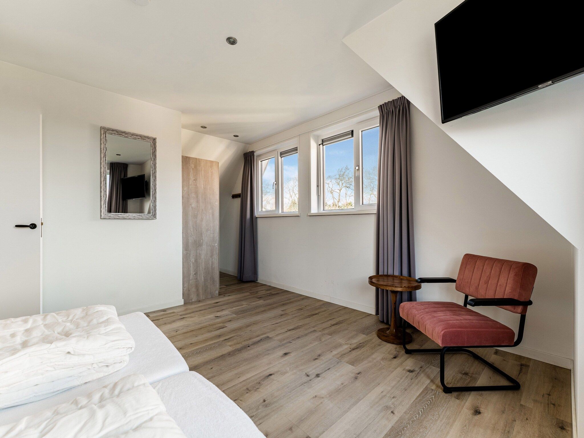 Een slaapkamer van So What 35A in De Koog Texel