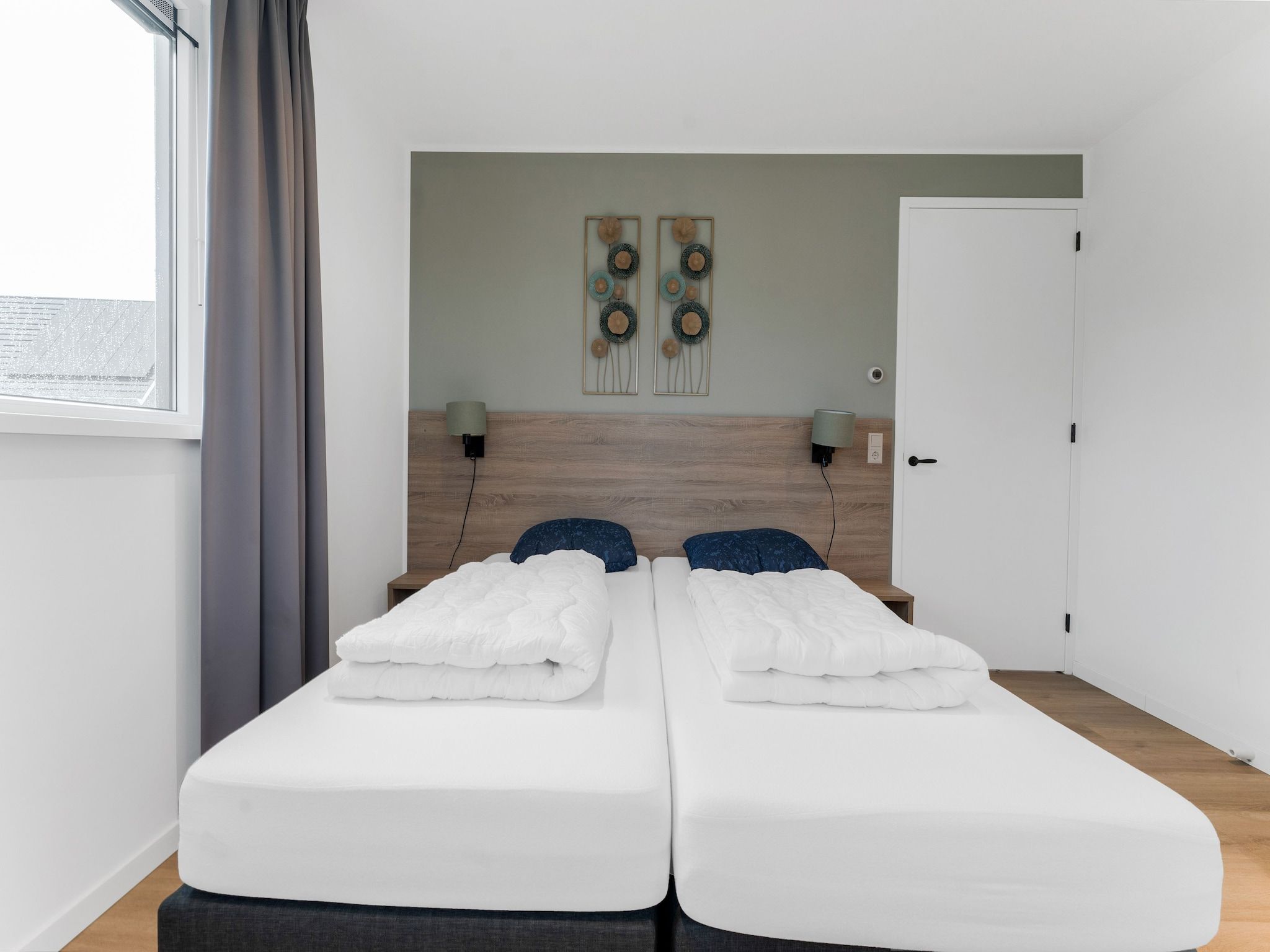 Een slaapkamer van So What 37A in De Koog Texel