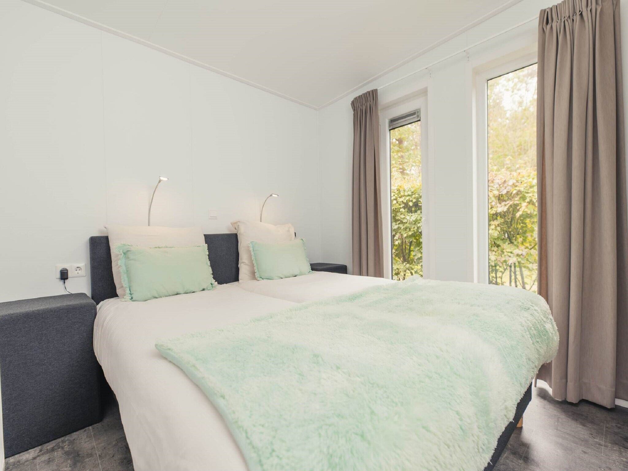 Een slaapkamer van Buitenplaats Holten 8 in Rijssen
