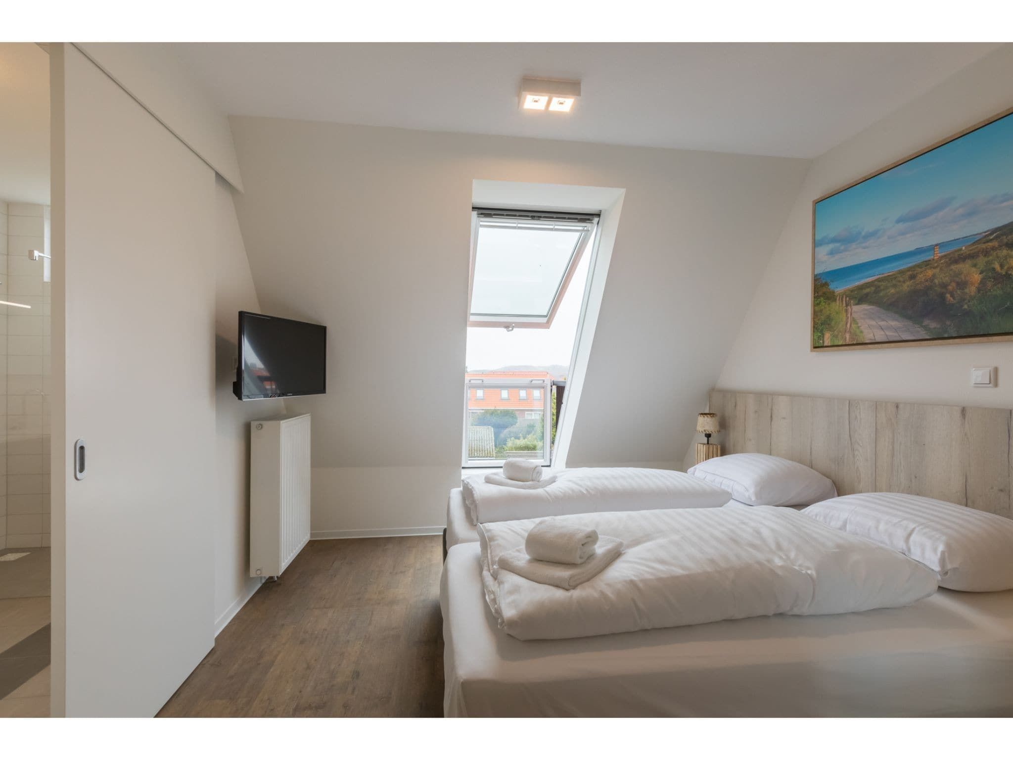 Een slaapkamer van Aparthotel Zoutelande - 2 pers luxe studio plus in Zoutelande
