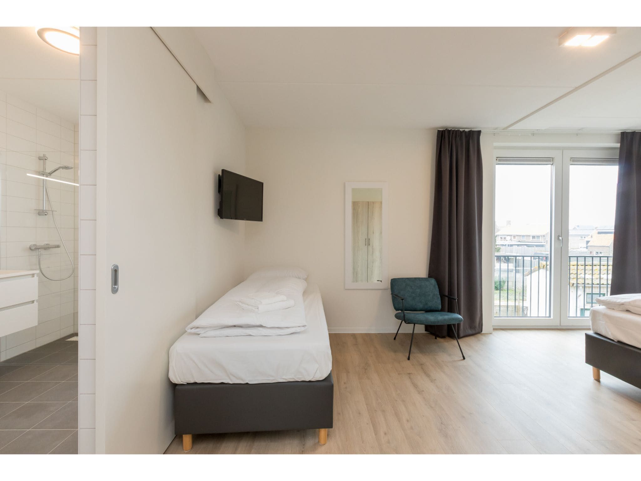 Een slaapkamer van Aparthotel Zoutelande - Luxe 3-persoons appartement in Zoutelande