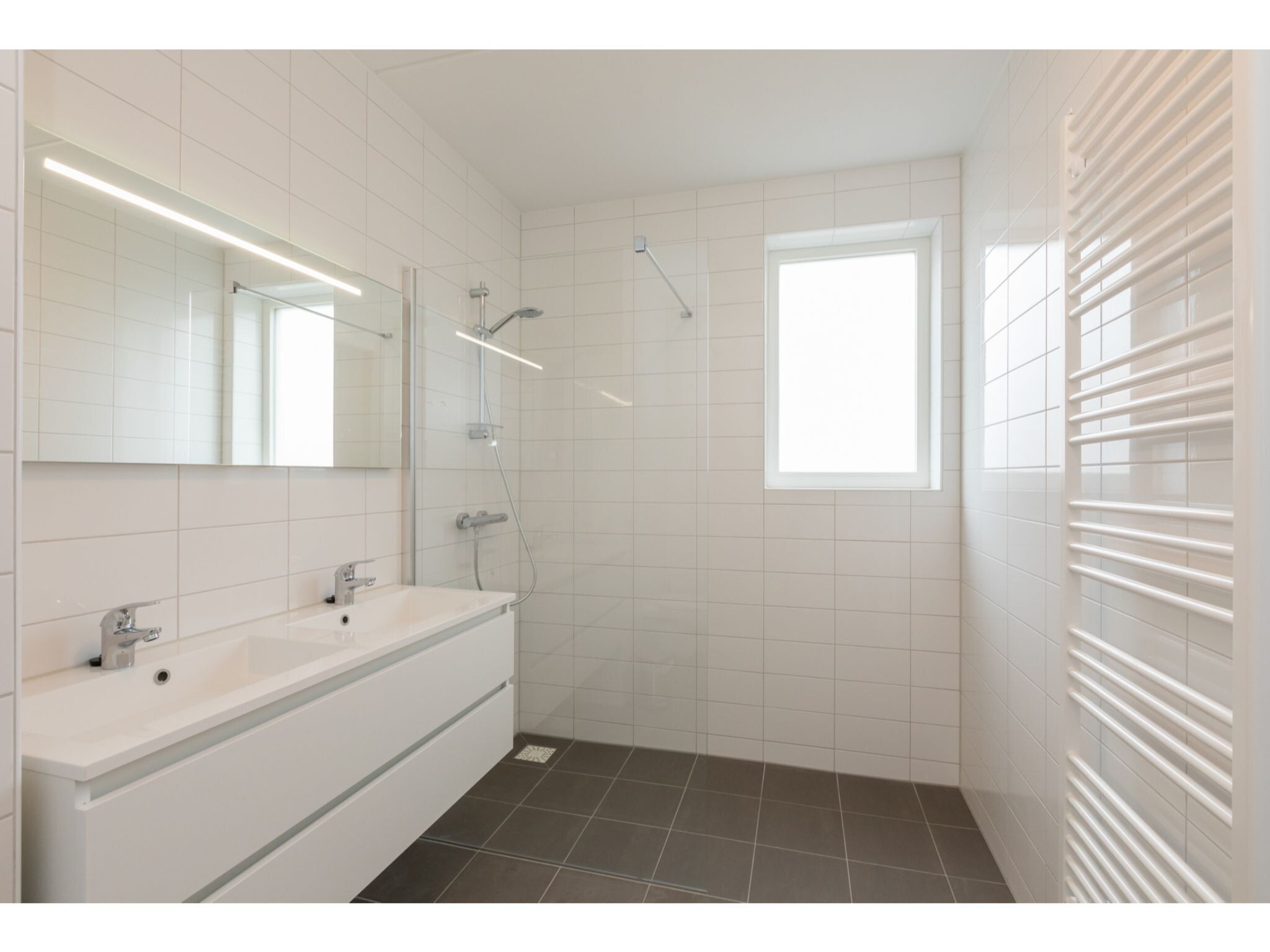 De badkamer van Aparthotel Zoutelande - Luxe 3-persoons appartement in Zoutelande