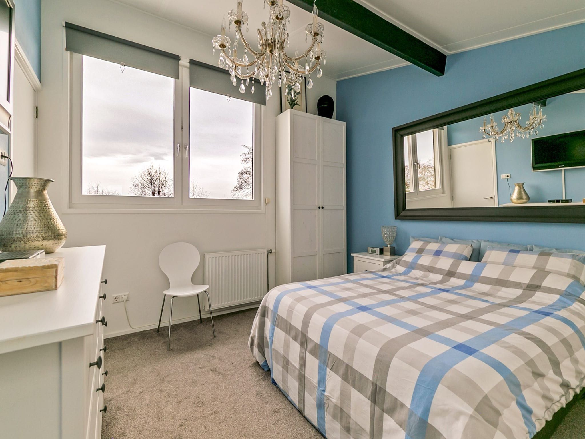 Een slaapkamer van Dennenlaan 17 in Kamperland