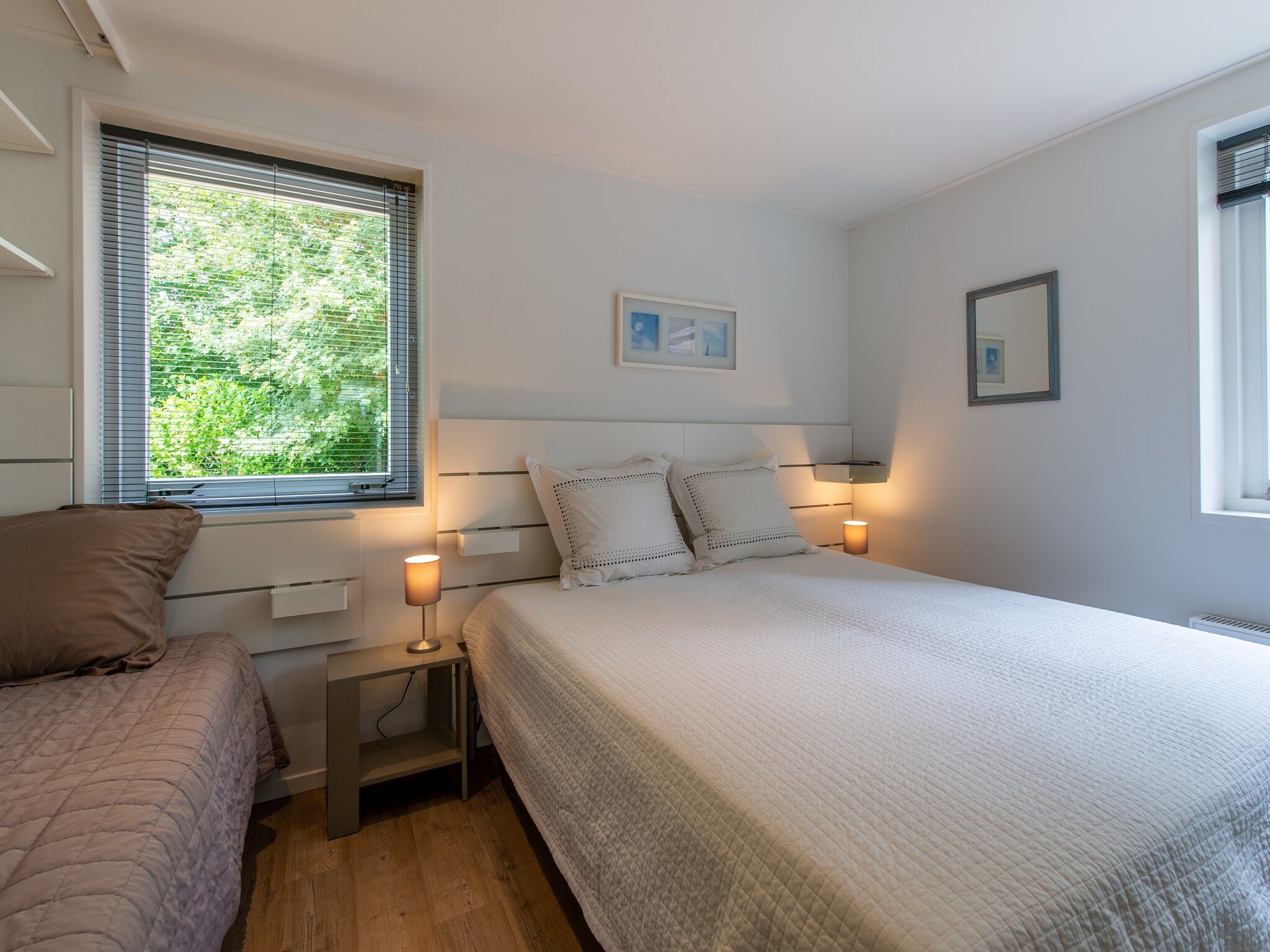Een slaapkamer van Dennenlaan 17 in Kamperland