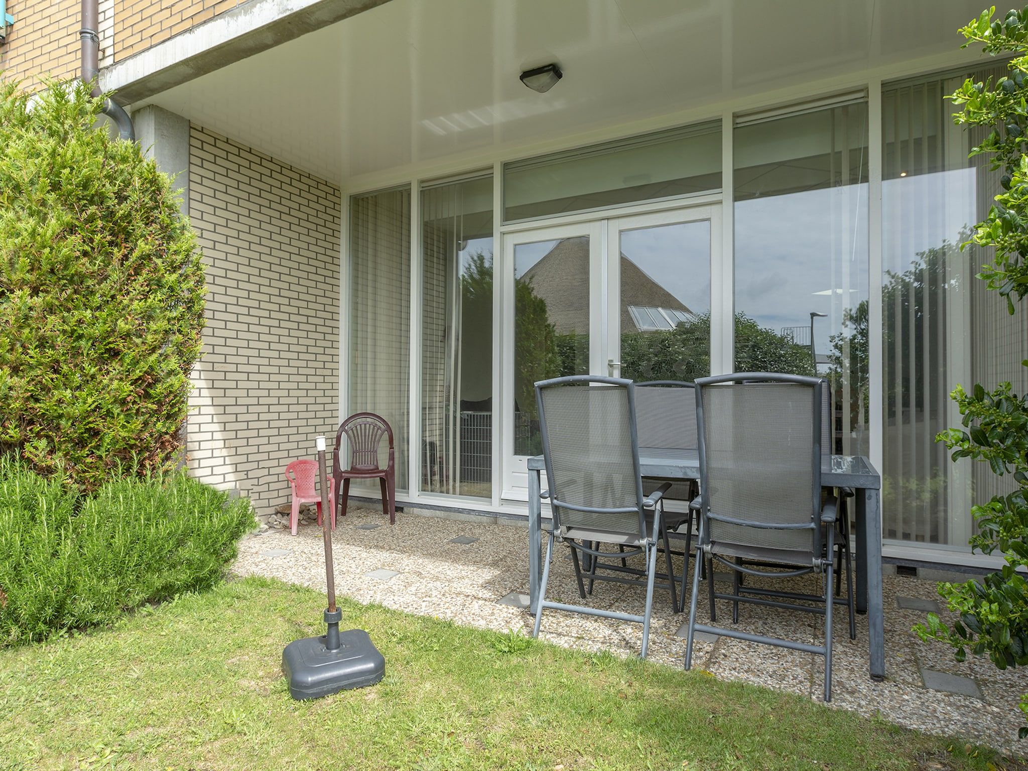 De tuin van Strandslag 115 in Julianadorp aan Zee