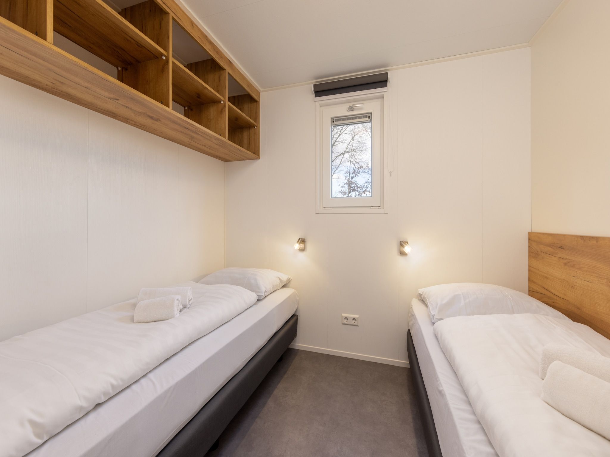Een slaapkamer van Hunzepark 13 in Gasselternijveen