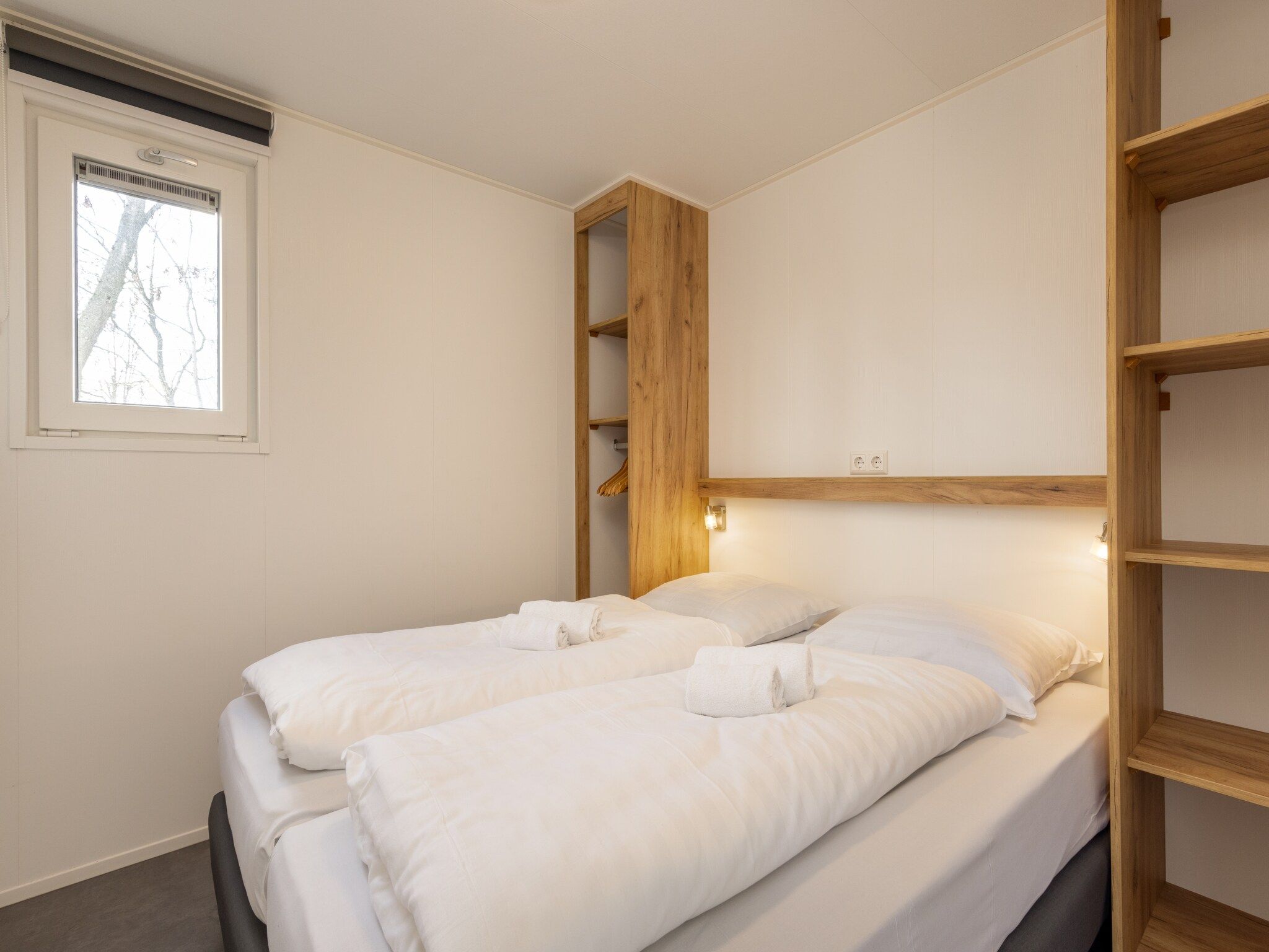 Een slaapkamer van Hunzepark 13 in Gasselternijveen