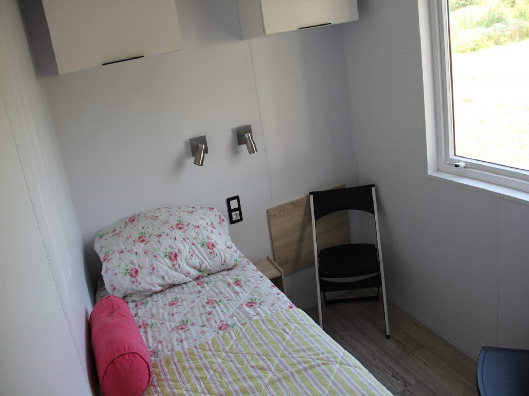 Een slaapkamer van Chalet Jildau in De Veenhoop