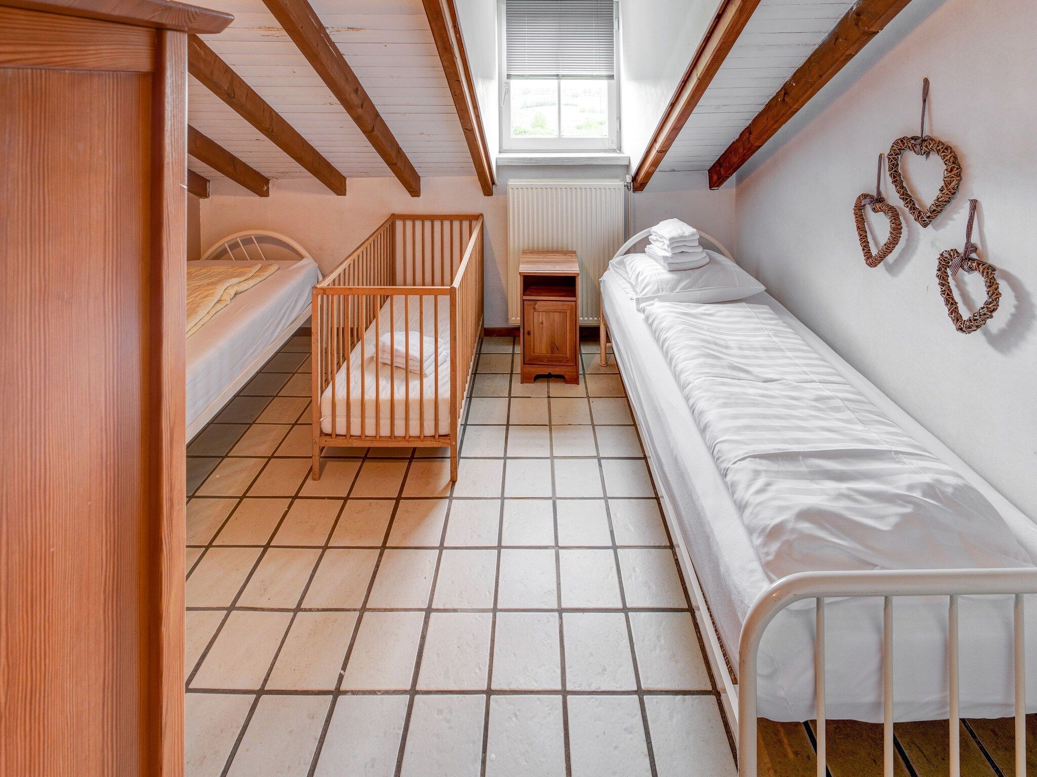 Een slaapkamer van Valleyview Cottages - NR14 in Voerendaal