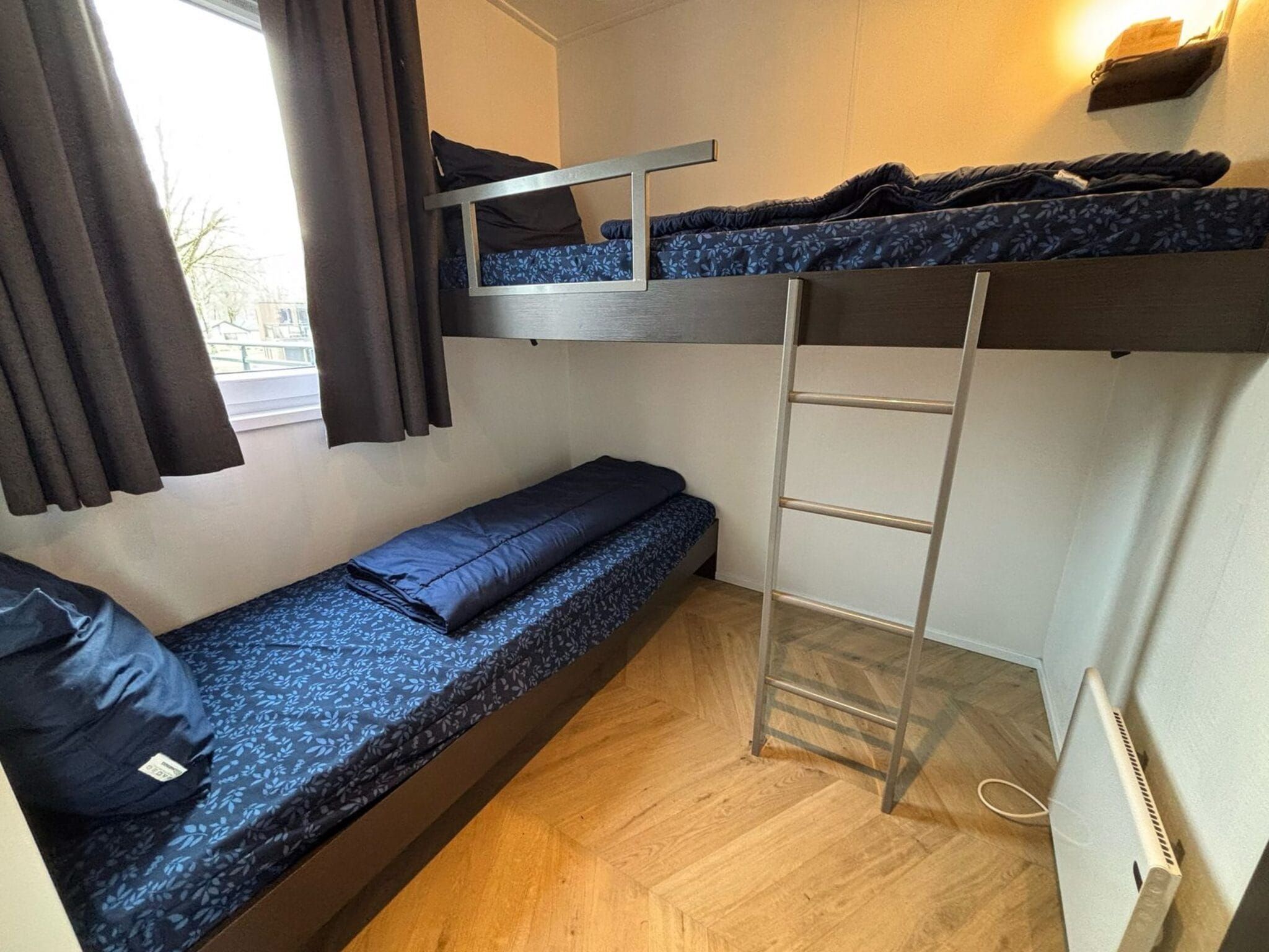 Een slaapkamer van Pavilion l'etage 6 in Kaatsheuvel