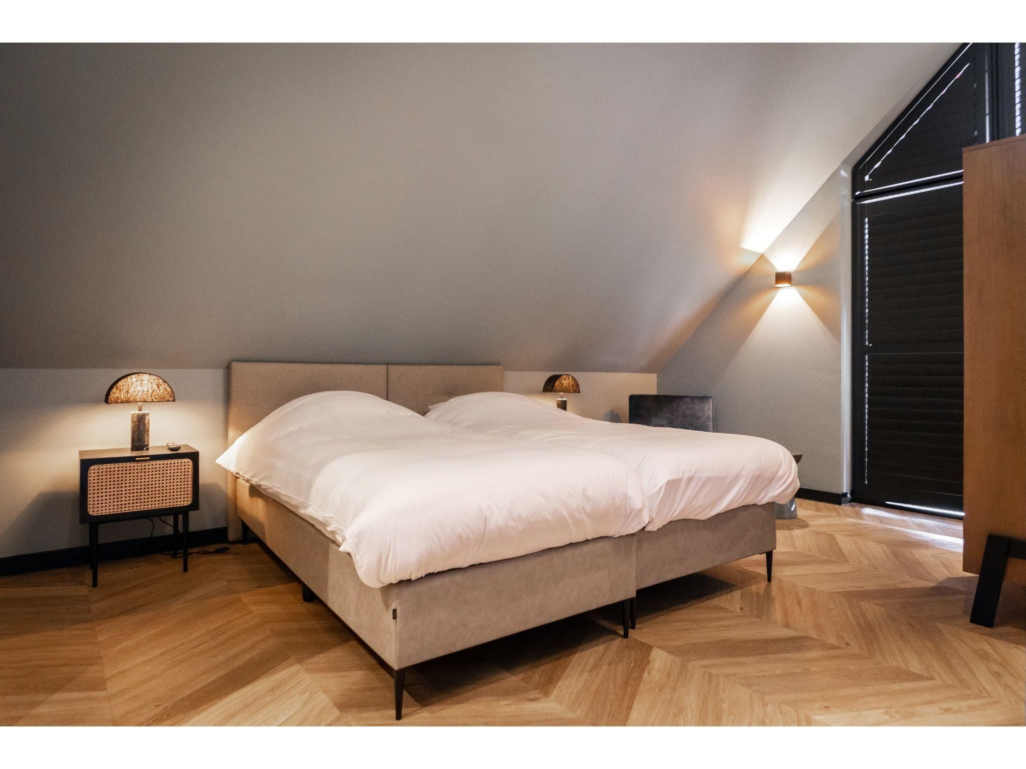 Een slaapkamer van Buytenveldt H6 in De Cocksdorp Texel