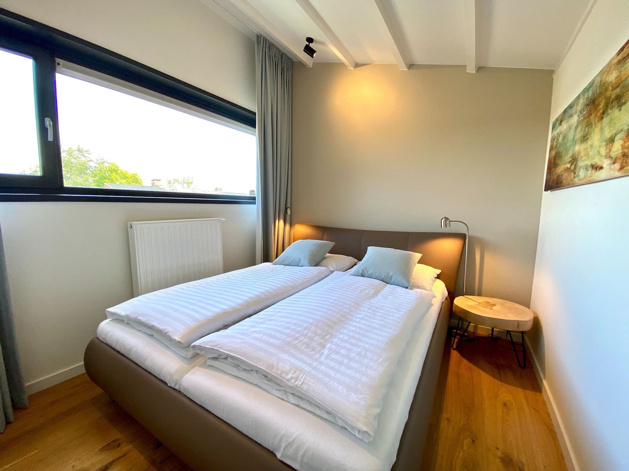 Een slaapkamer van Lepelblad 44 in Nieuwvlietbad