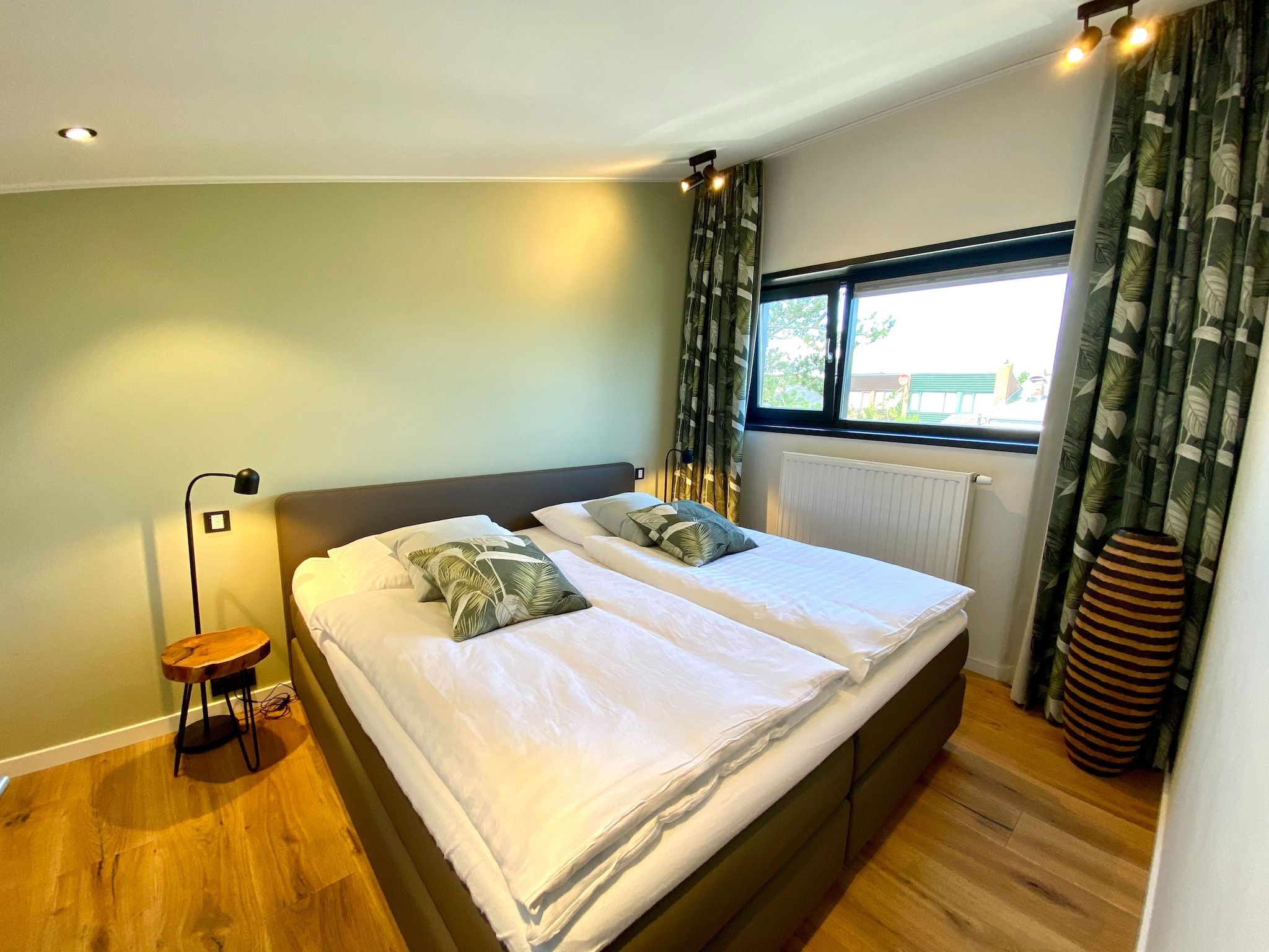 Een slaapkamer van Lepelblad 44 in Nieuwvlietbad