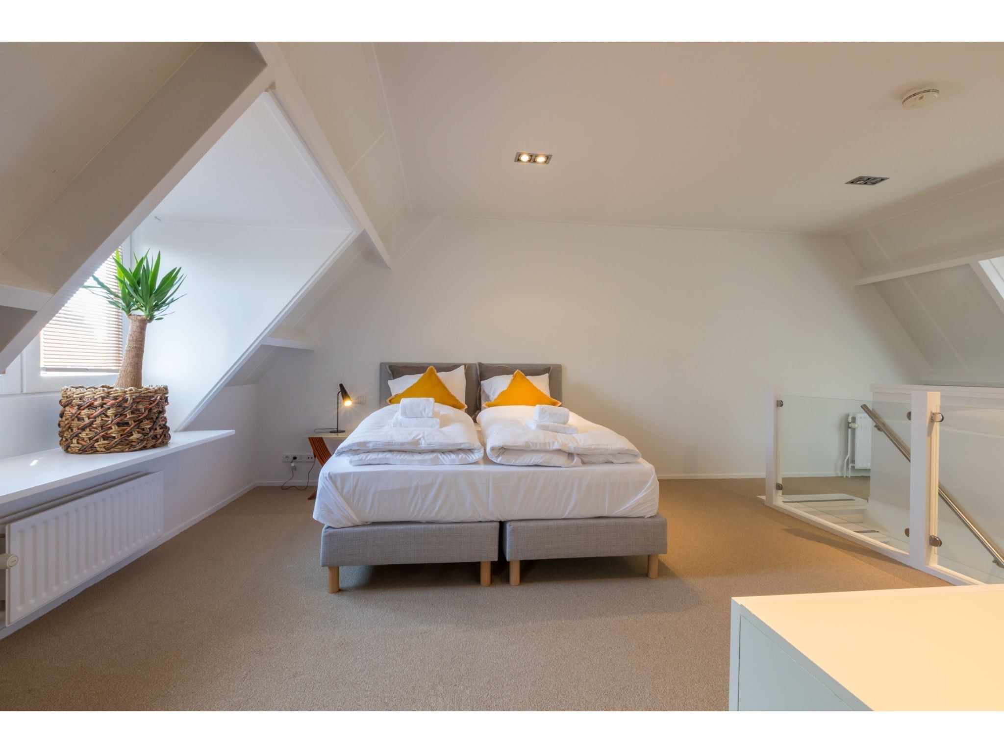 Een slaapkamer van Ooststraat 7 in Domburg