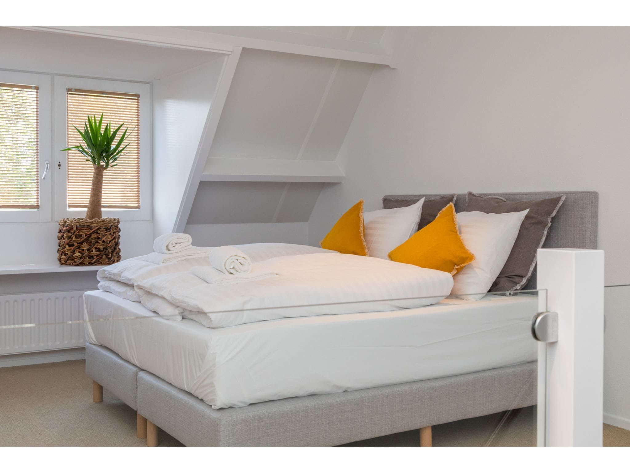 Een slaapkamer van Ooststraat 7 in Domburg