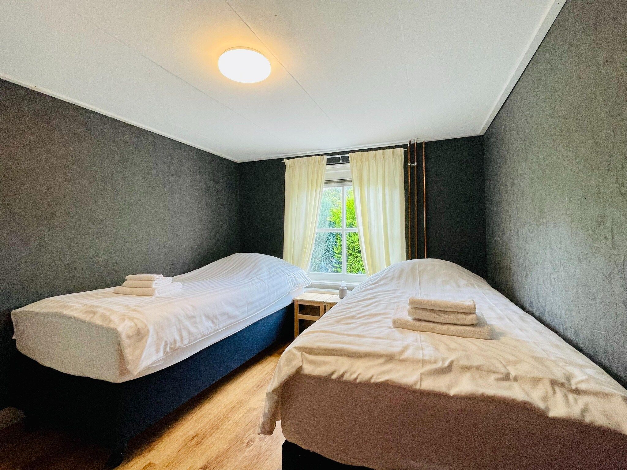 Een slaapkamer van Welskerveen 5 in De Heurne