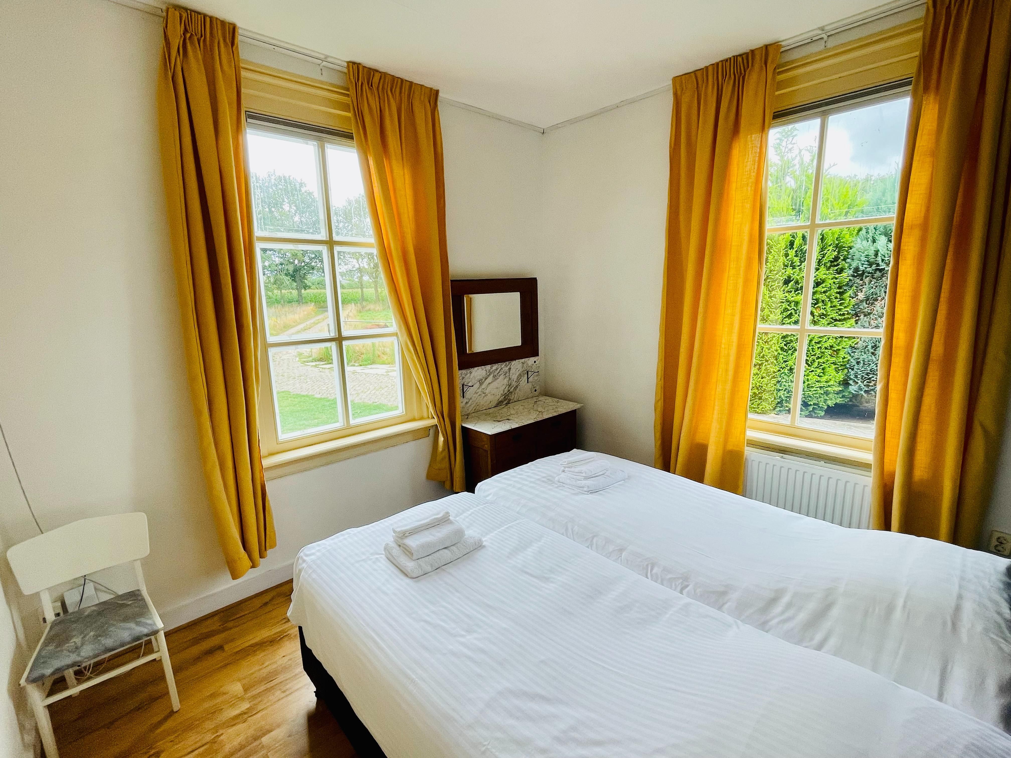 Een slaapkamer van Welskerveen 5 in De Heurne